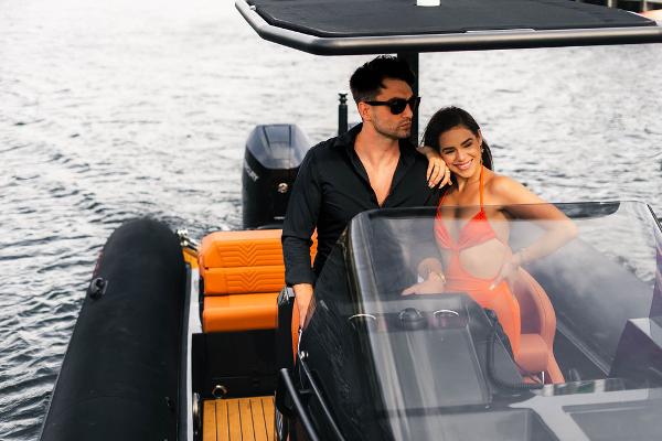 Couple enjoying a ride on a 2024 Onda Magna boat.