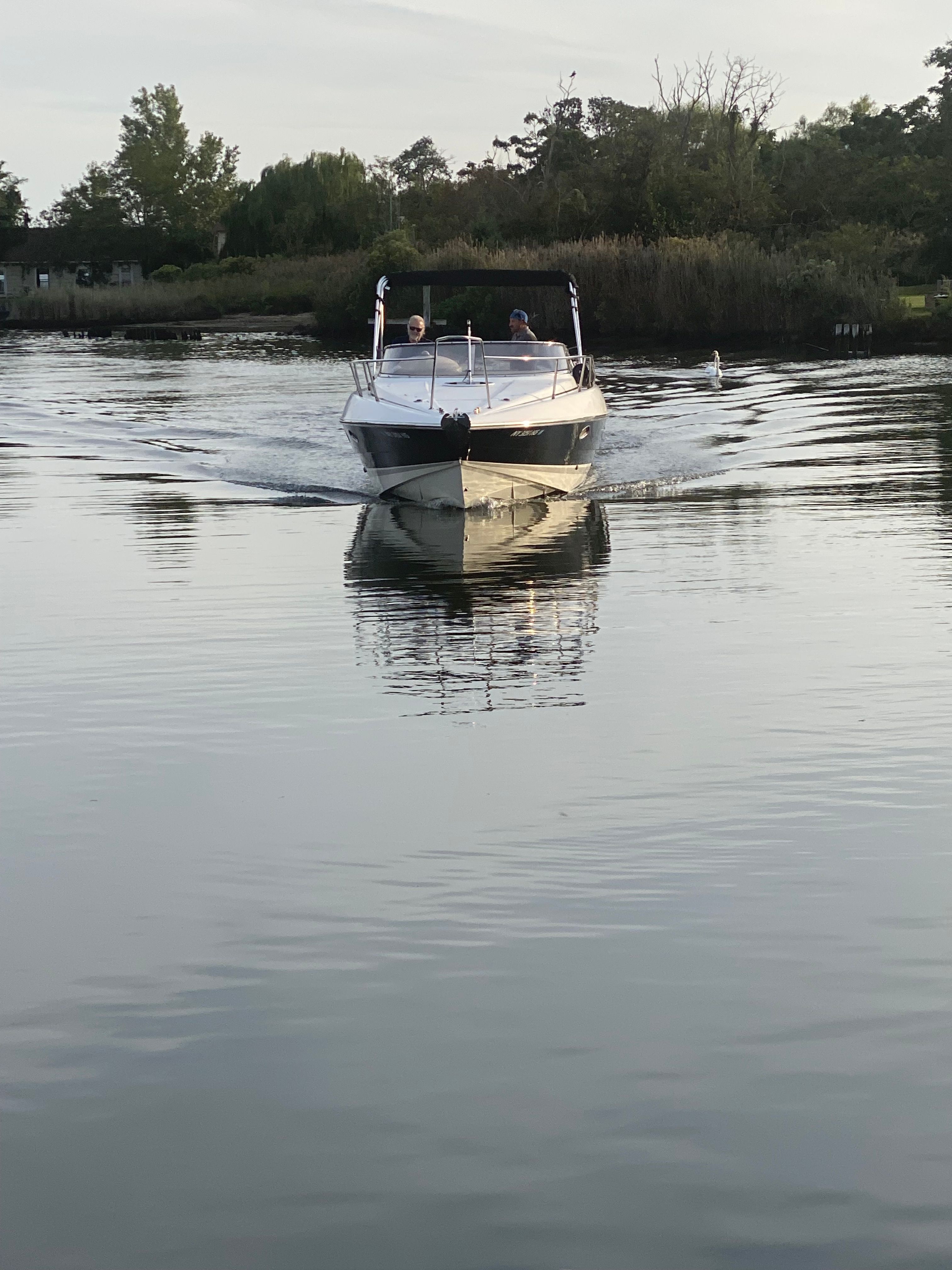 1994 Sunseeker Hawk 31 cruising on calm water.