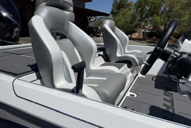 2026 Nitro Z19 XL Pro boat interior with sleek gray seating and steering wheel.
