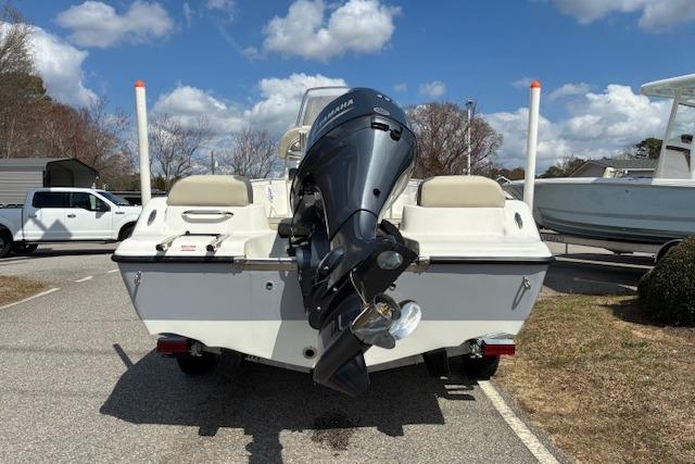 Rear view of a 2026 Key West 189 FS boat with outboard motor.