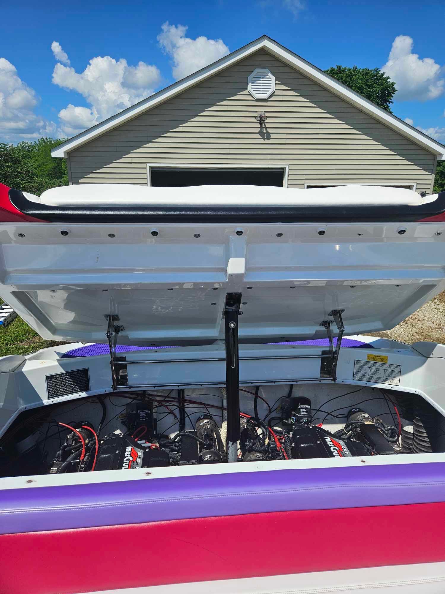1997 Baja 38 Special Boss engine compartment with open hatch.