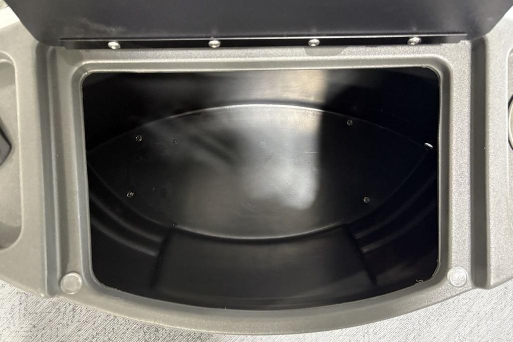 Open storage compartment of 2026 Sun Tracker Bass Buggy 18 DLX boat.