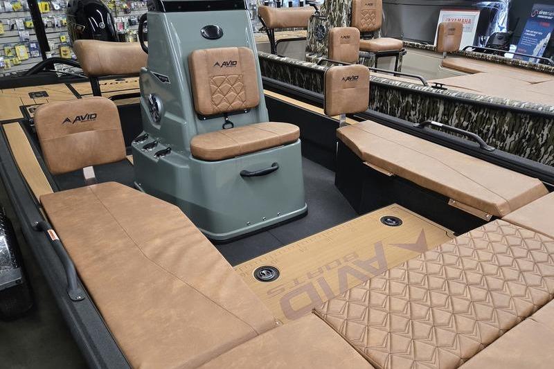 2026 Avid 207 Recon boat interior with tan seating and modern design.