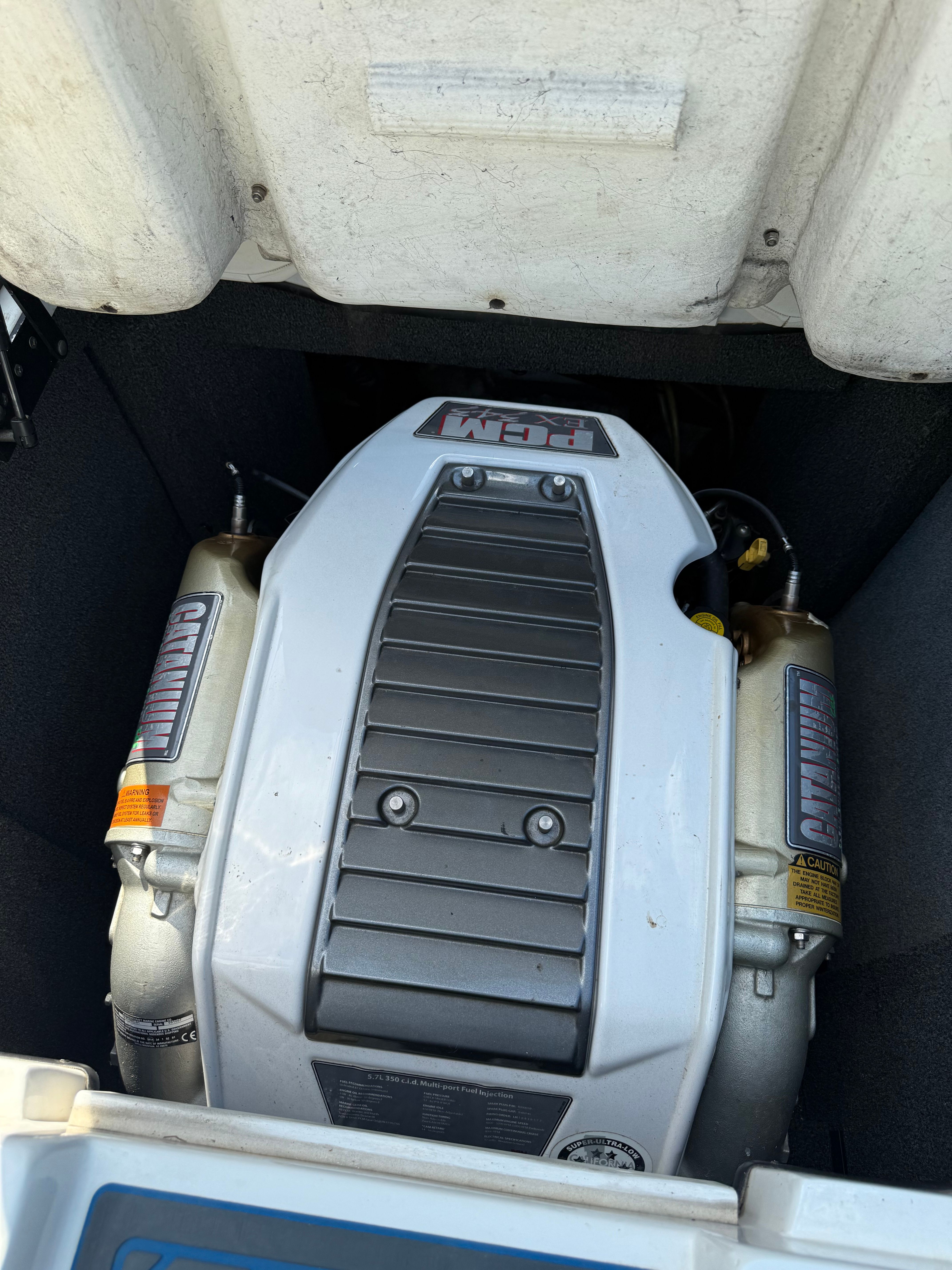 Engine compartment of a 2012 Custom Z3 with RPM cover.