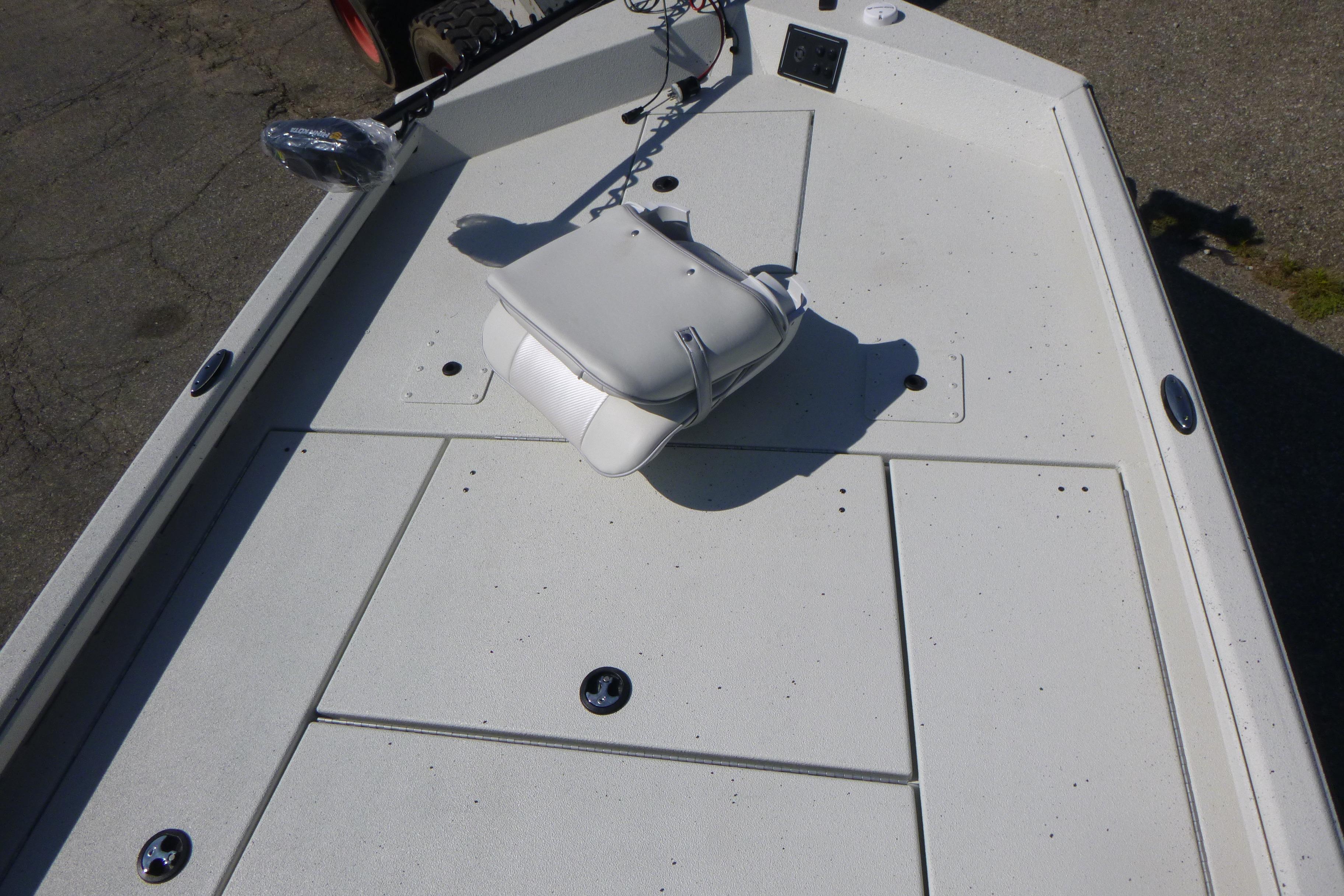 2025 Ranger RB210 boat deck with white seat and storage compartments.