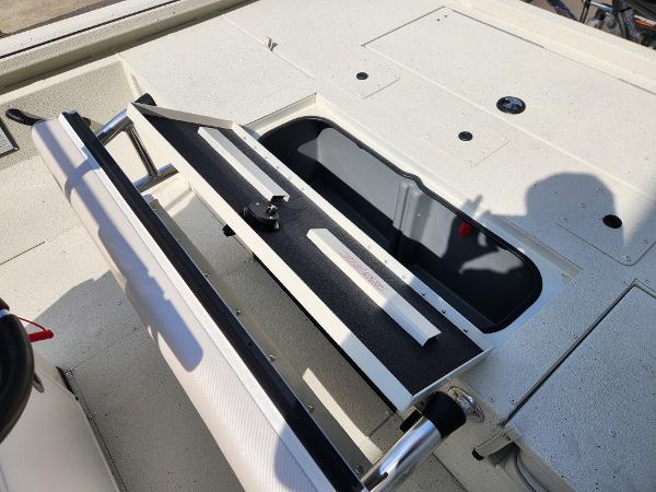 2025 Ranger RB200 boat storage compartment with open lid and seating area.