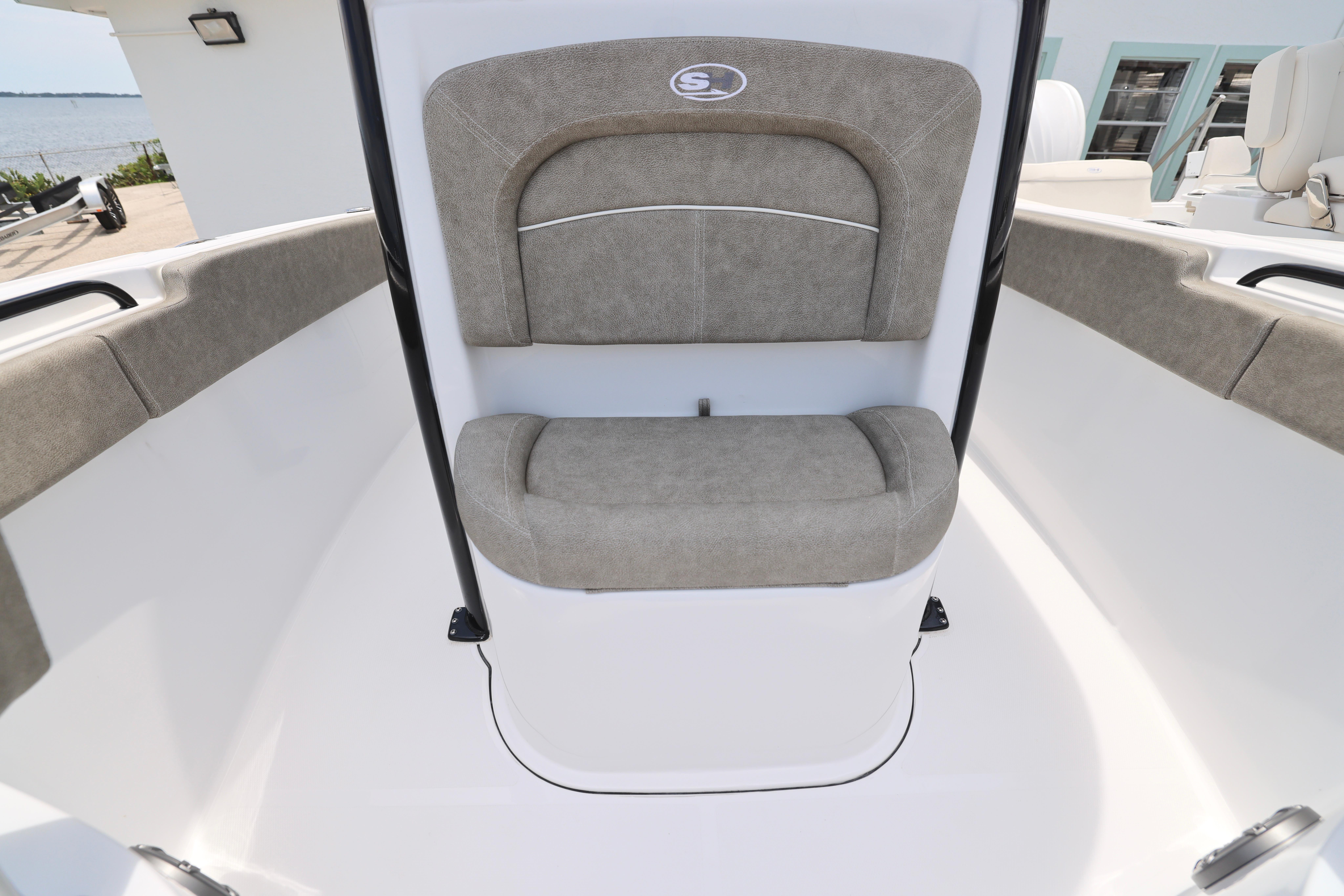 2026 Sea Hunt Ultra 245 SE boat interior with cushioned seating and sleek design.