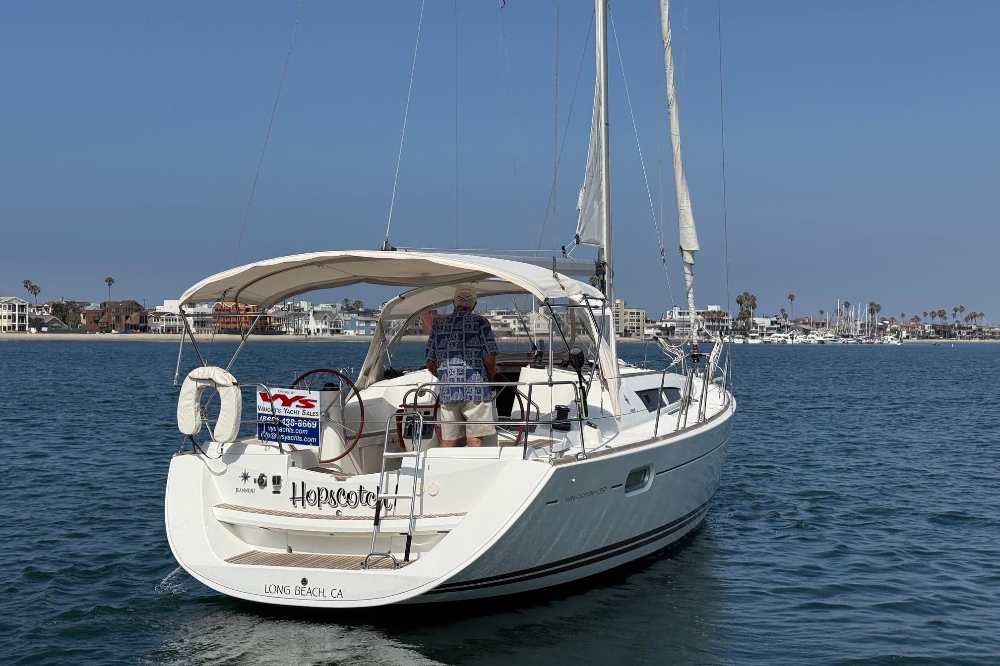 2007 Jeanneau Sun Odyssey 39 DS sailboat on calm waters near Long Beach, CA.