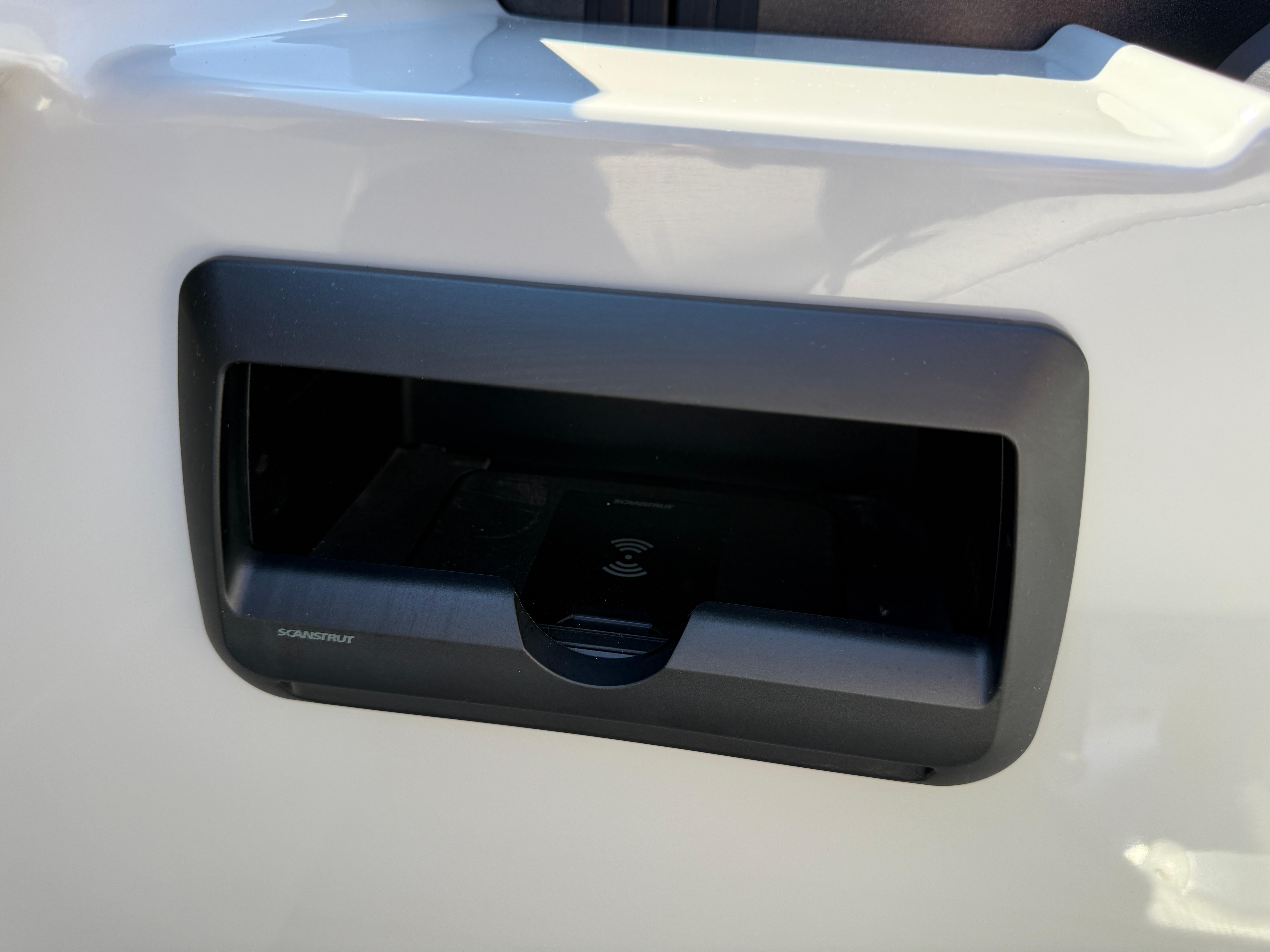 2026 Bentley Pontoons Legacy 223 Navigator wireless charging dock detail.