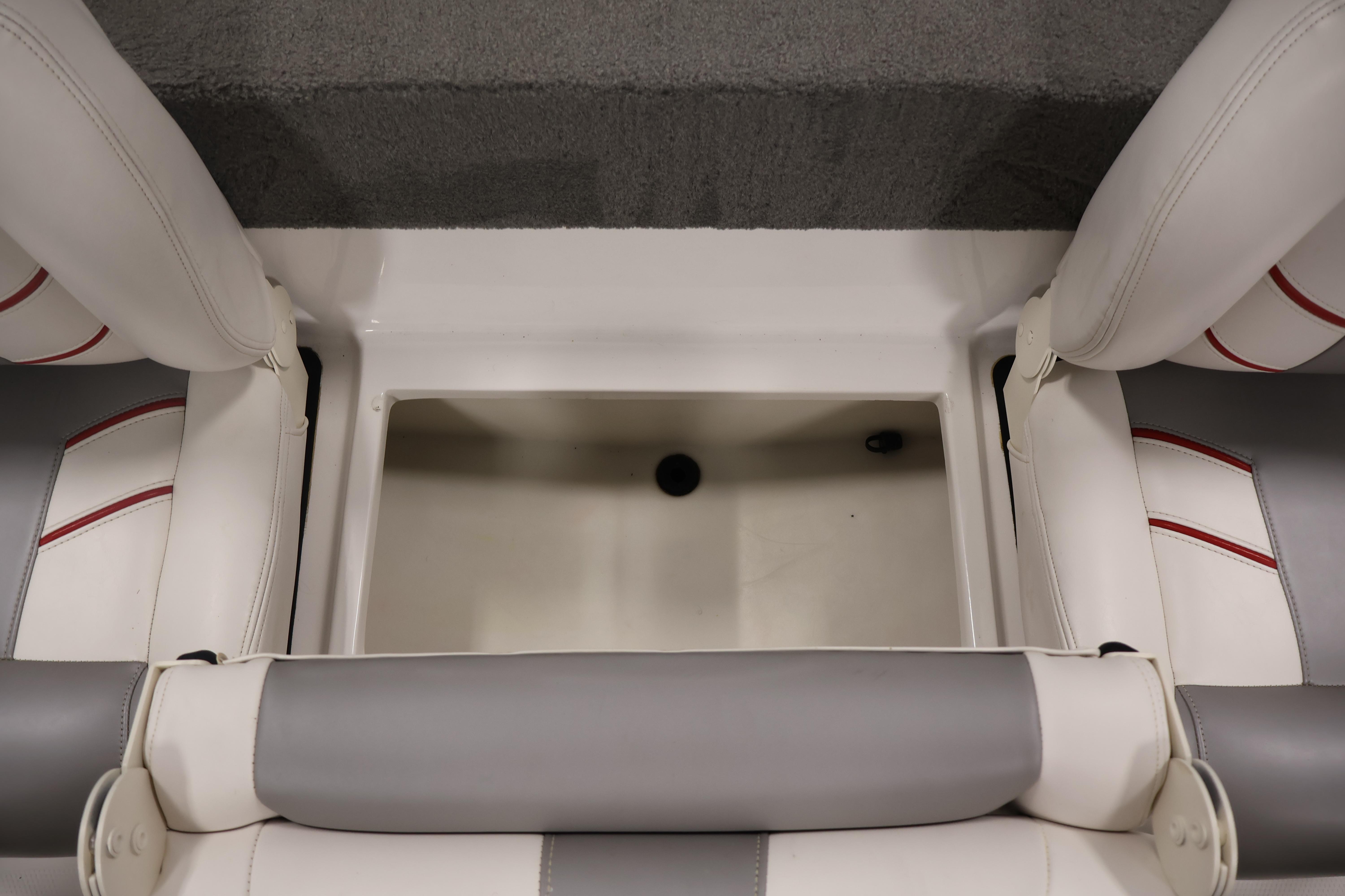 2019 Nitro Z19 Sport boat interior storage compartment with cushioned seating.