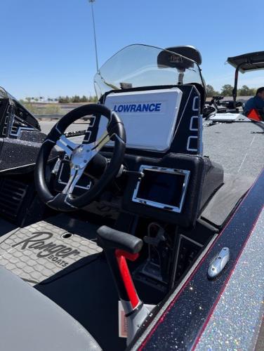 2025 Ranger Z519R Cup-Equipped boat dashboard with Lowrance electronics and steering wheel.