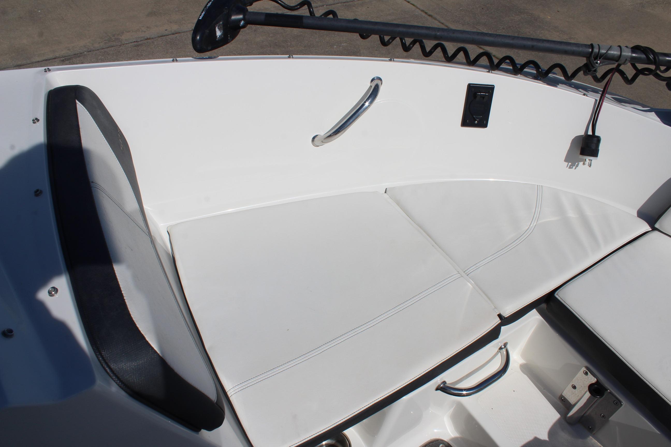 White seating area on a 2015 Sea Ray 19 SPX OB boat.
