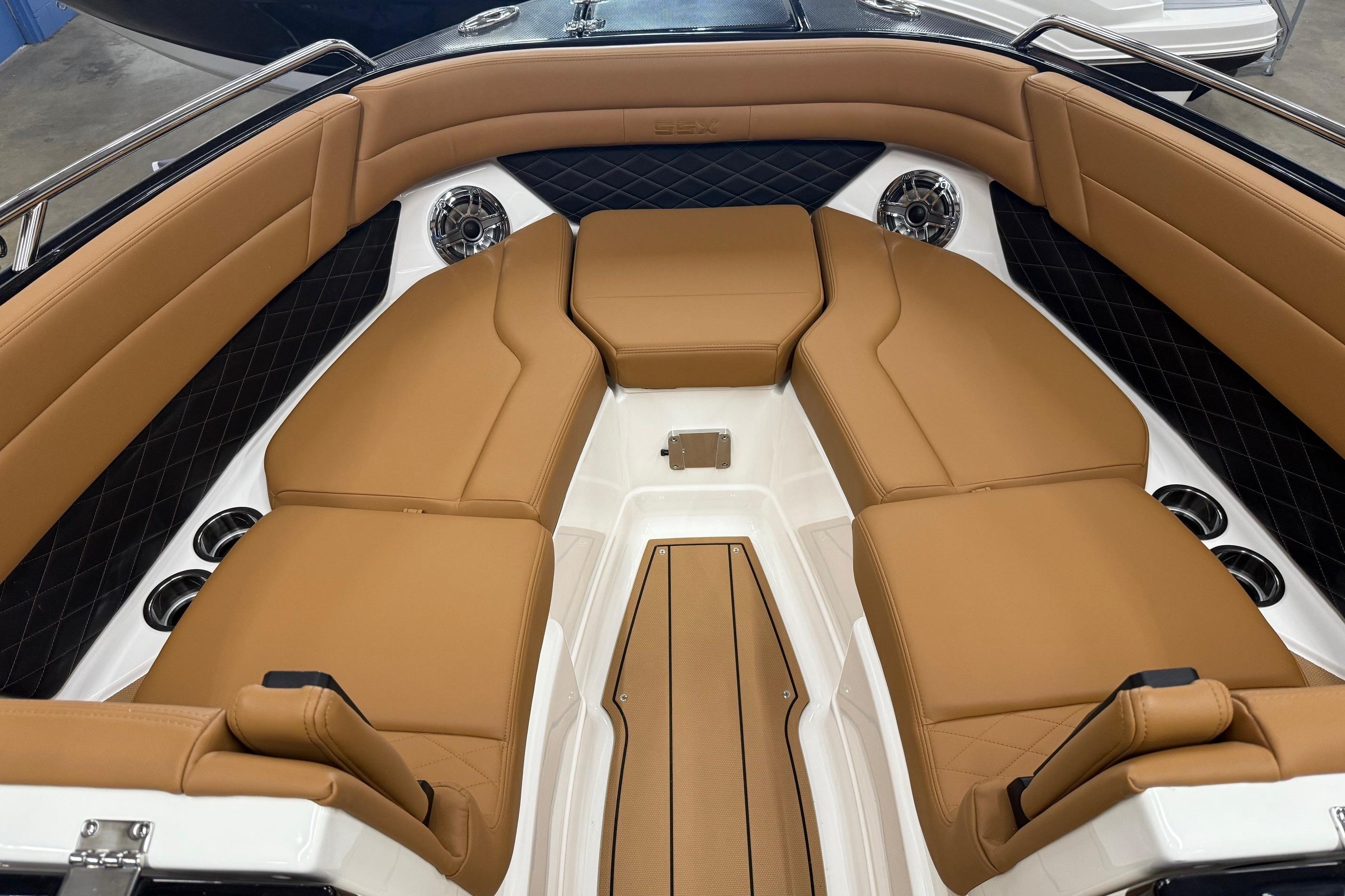 Luxurious interior of 2026 Chaparral SSX 6 boat with tan leather seating.