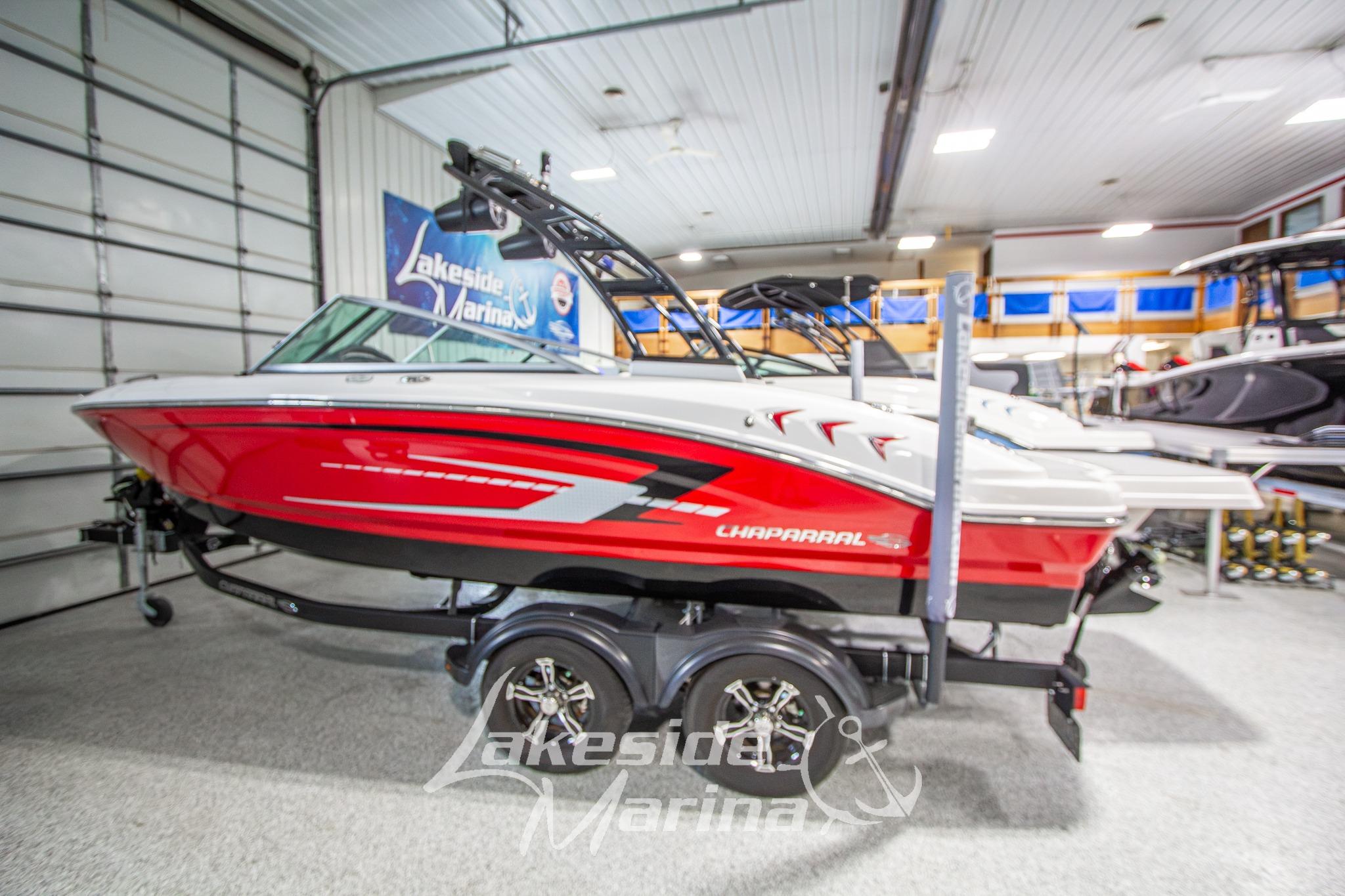 2022 Chaparral 21 SSi boat in showroom, red and white design, Lakeside Marina.