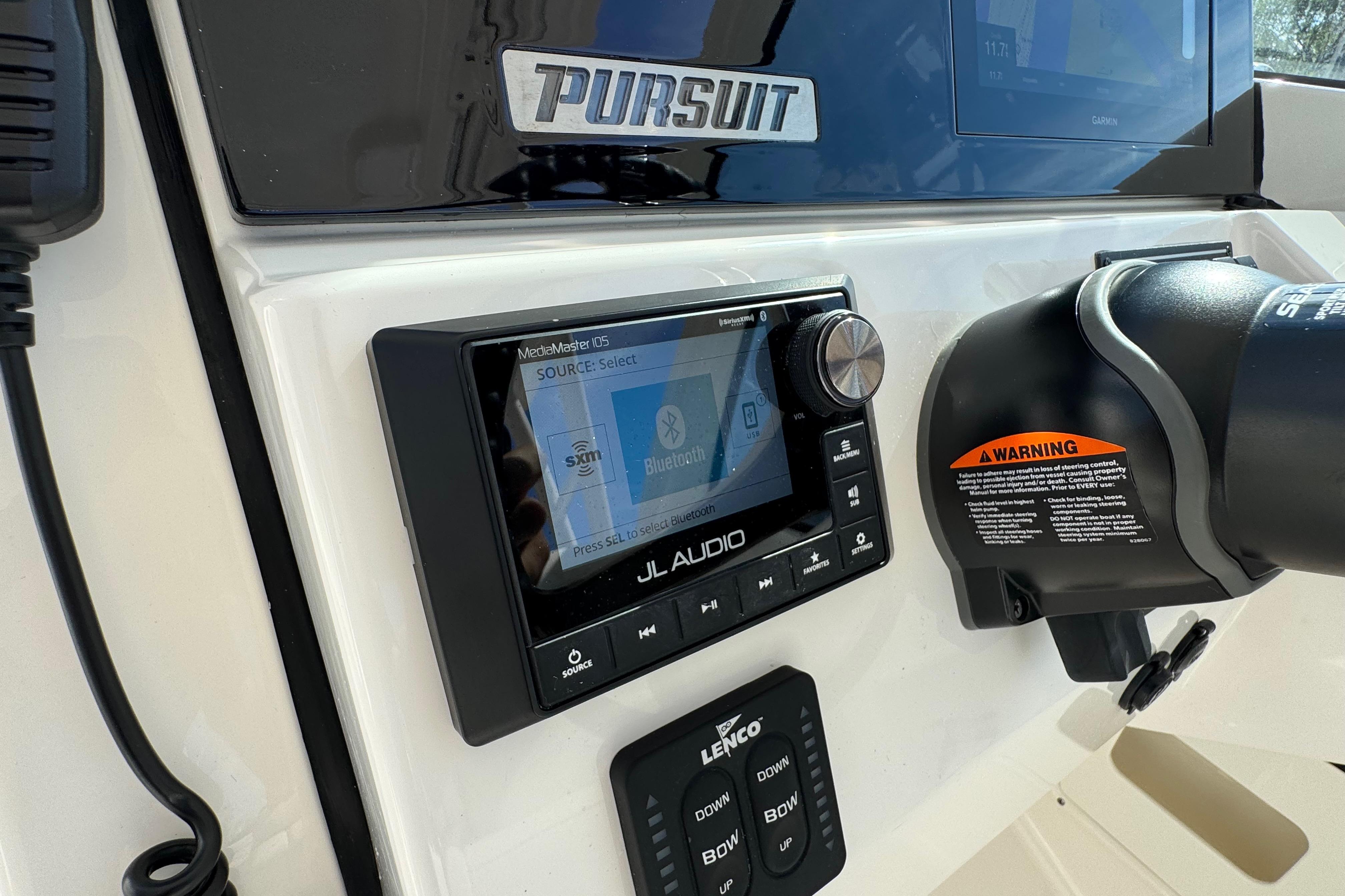 Control panel of 2022 Pursuit DC 266 Dual Console with JL Audio system.