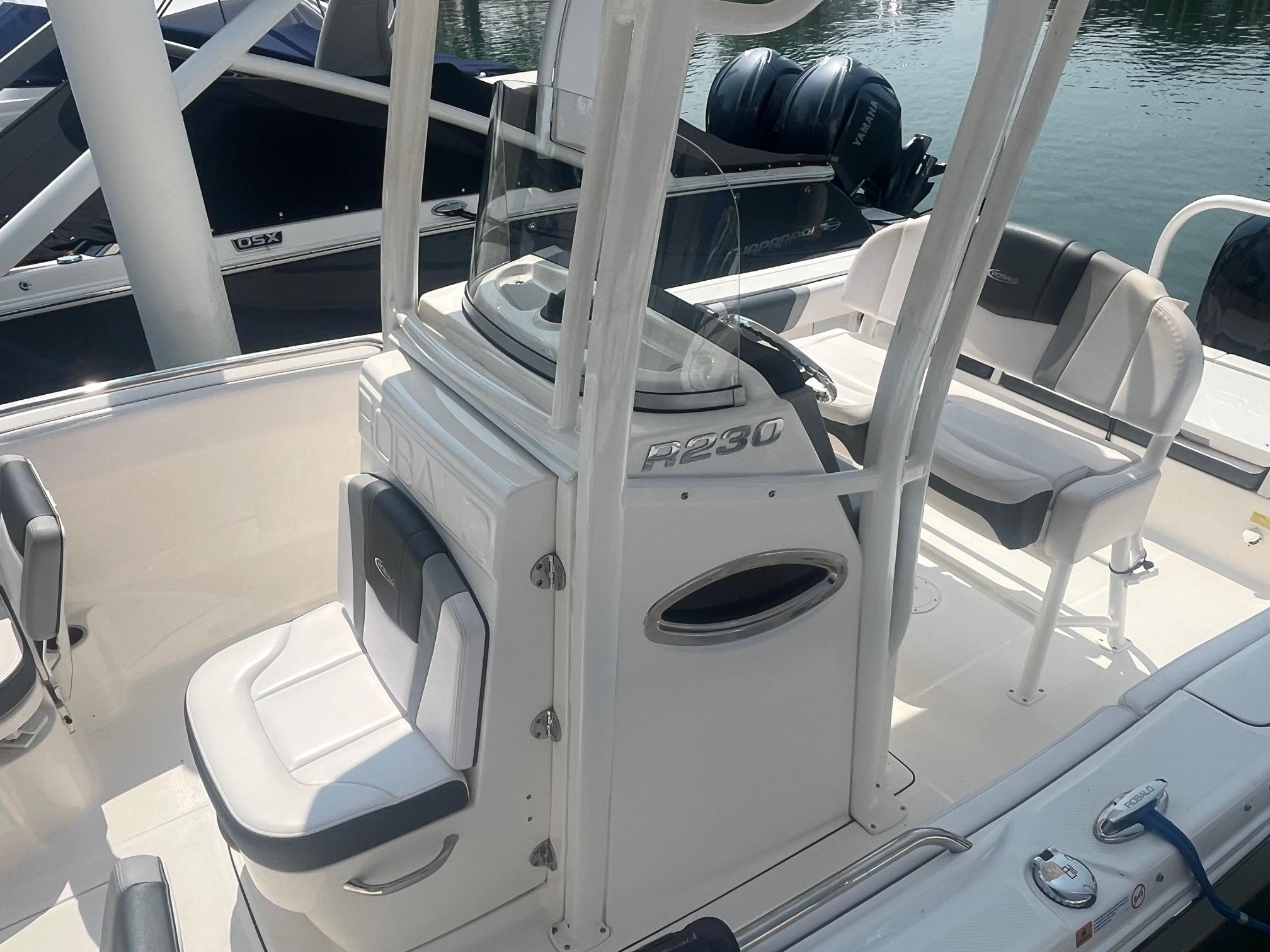 2020 Robalo R230 Center Console boat interior with seating and console details.