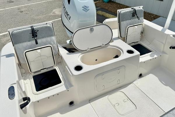 2025 Carolina Skiff 21 LS boat interior with storage compartments and seating.