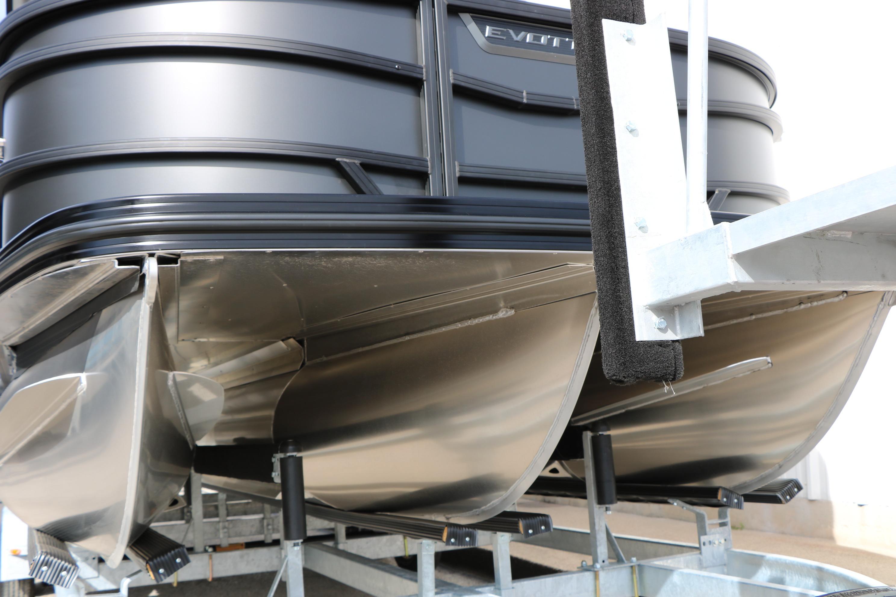 2026 Evotti 521QL pontoon boat on trailer, showcasing sleek design and sturdy construction.