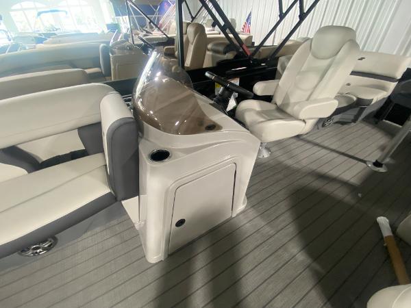 2024 Starcraft EXS 1 boat interior with helm station and seating.