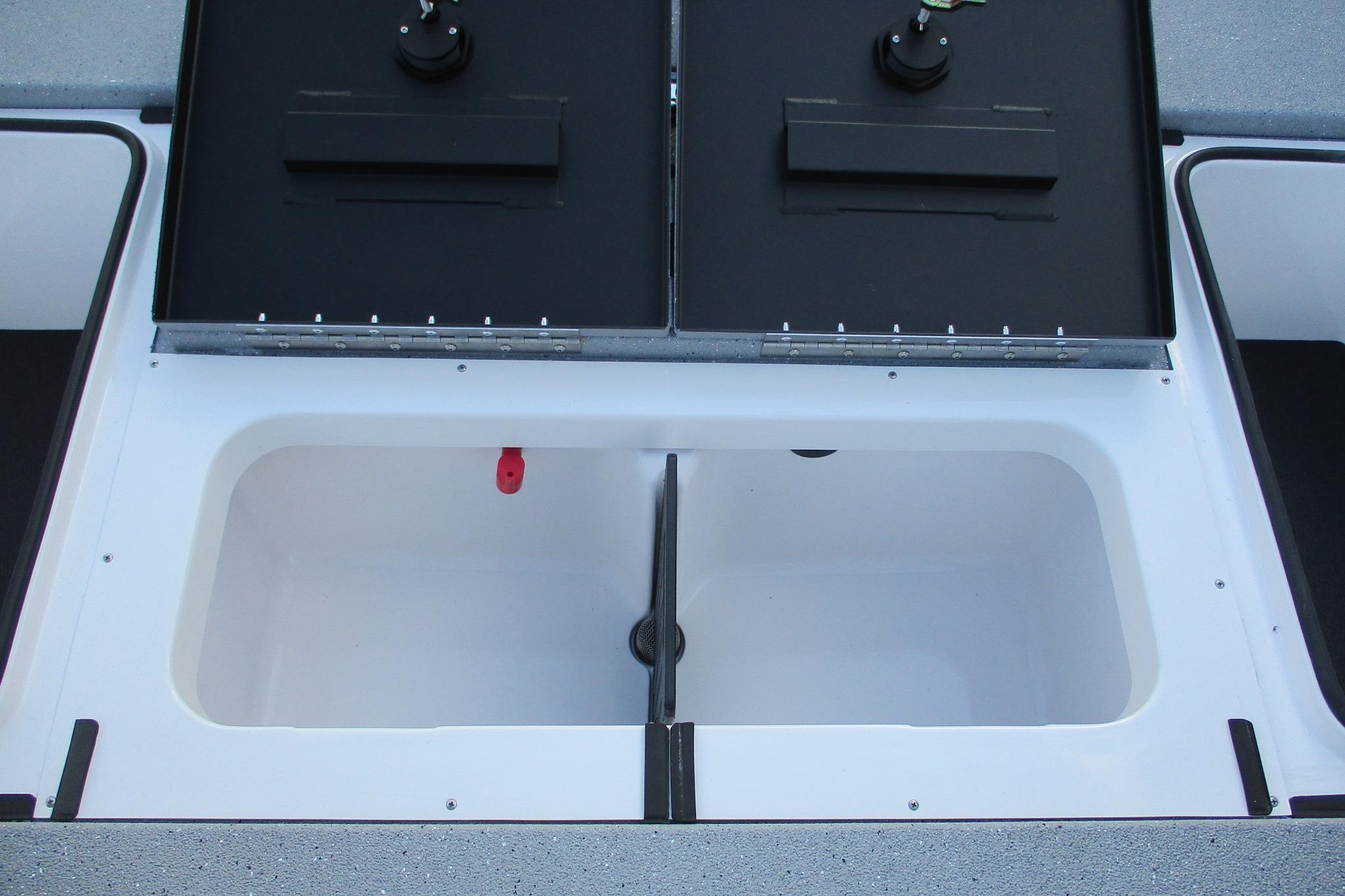 2026 Vexus AVX2080 boat storage compartments with open lids, showcasing interior space.