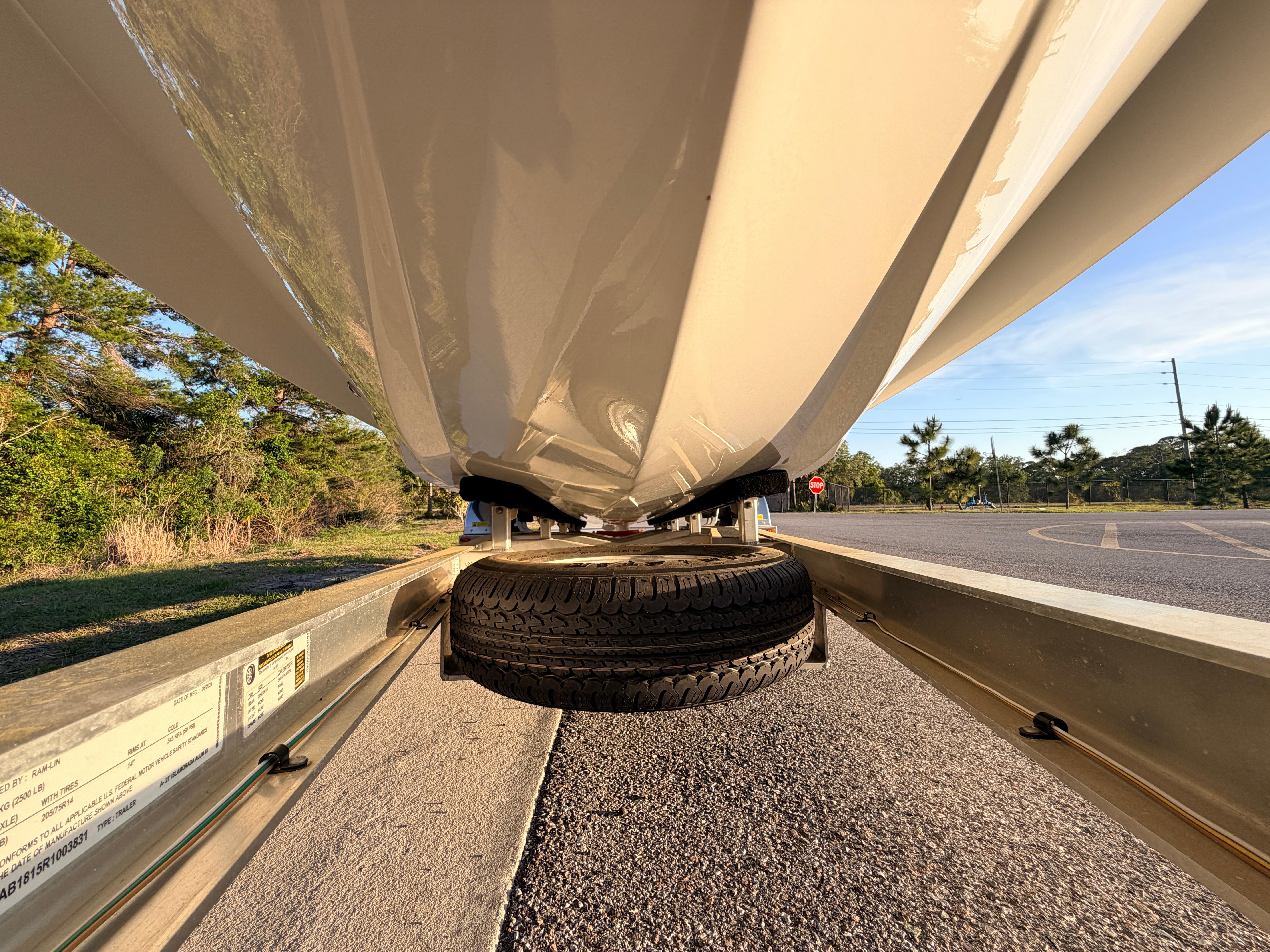 Underneath view of a 2025 Chittum Skiffs Islamorada 21 on a trailer.