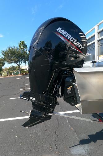 2024 Sun Tracker Fishin' Barge 22 XP3 with Mercury outboard motor.