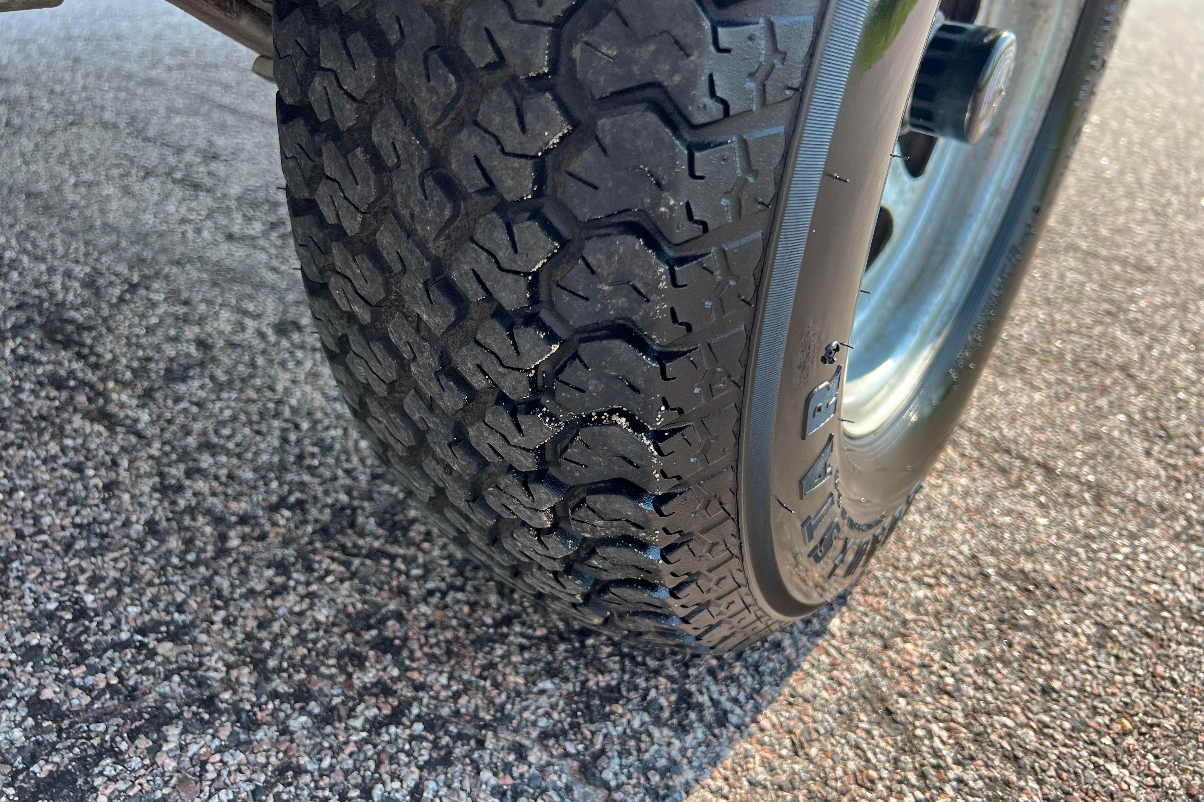 Close-up of a tire on a 2012 Sea Fox 206 Center Console trailer.