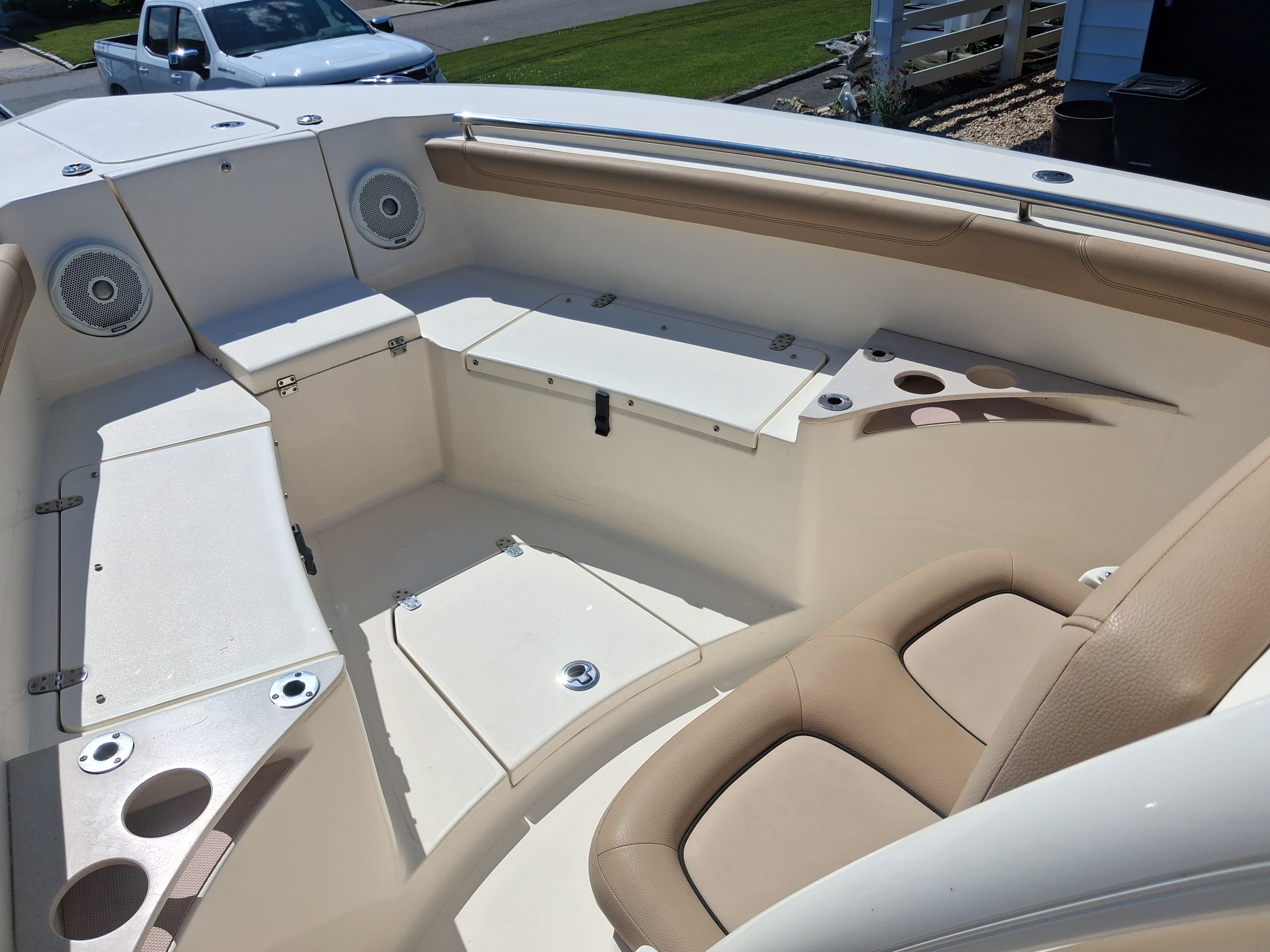 Interior of a 2018 Scout 255LXF boat with seating area.