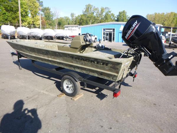2024 Tracker Grizzly 1648 SC boat with Mercury outboard motor on trailer.