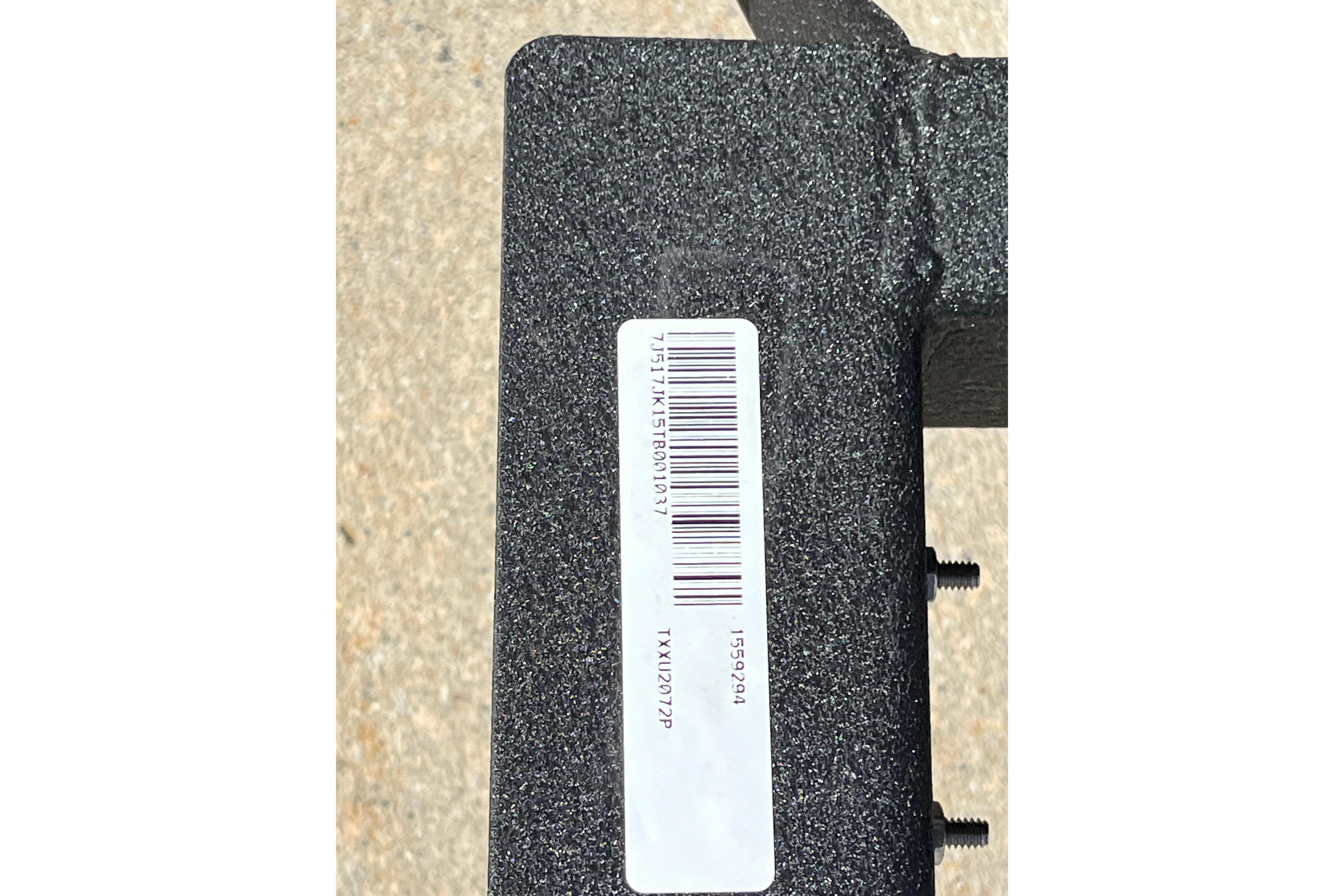 Barcode label on Tracker Grizzly 2072 Utility, 2026 model, textured surface.