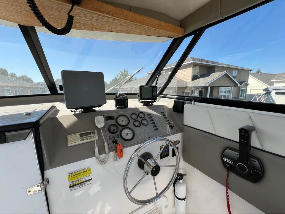 Interior view of Bayliner 2452 helm, year 1999.