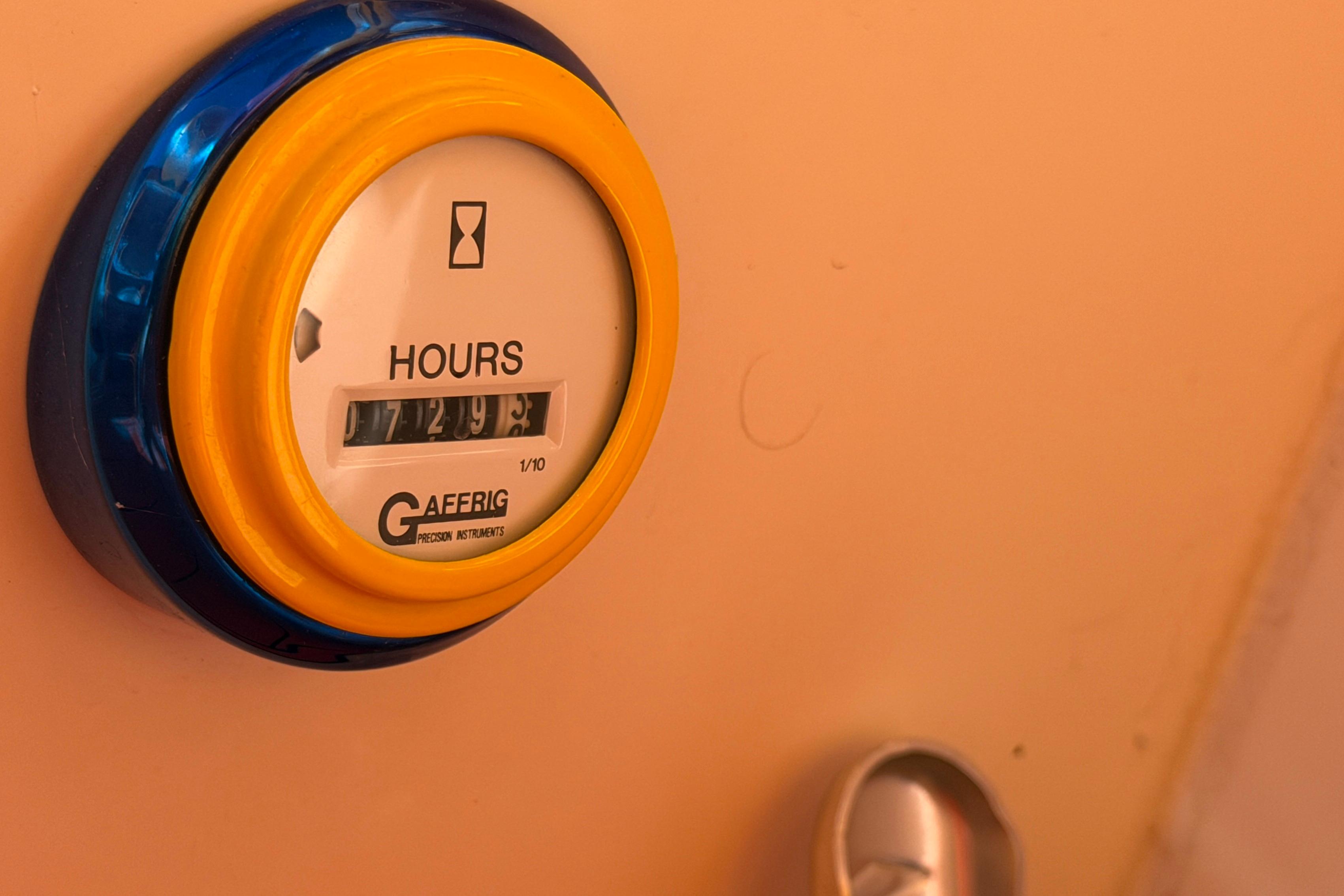 Hour meter on 2002 Cigarette 35' Cafe Racer boat dashboard, displaying 729.3 hours.