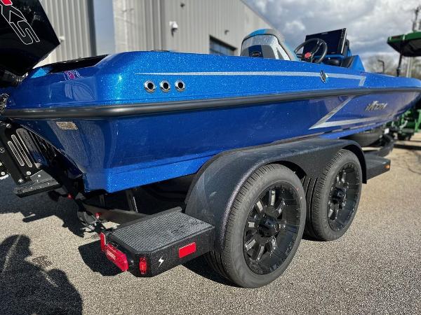 2024 iKon LX 20 blue boat on a dual-axle trailer.