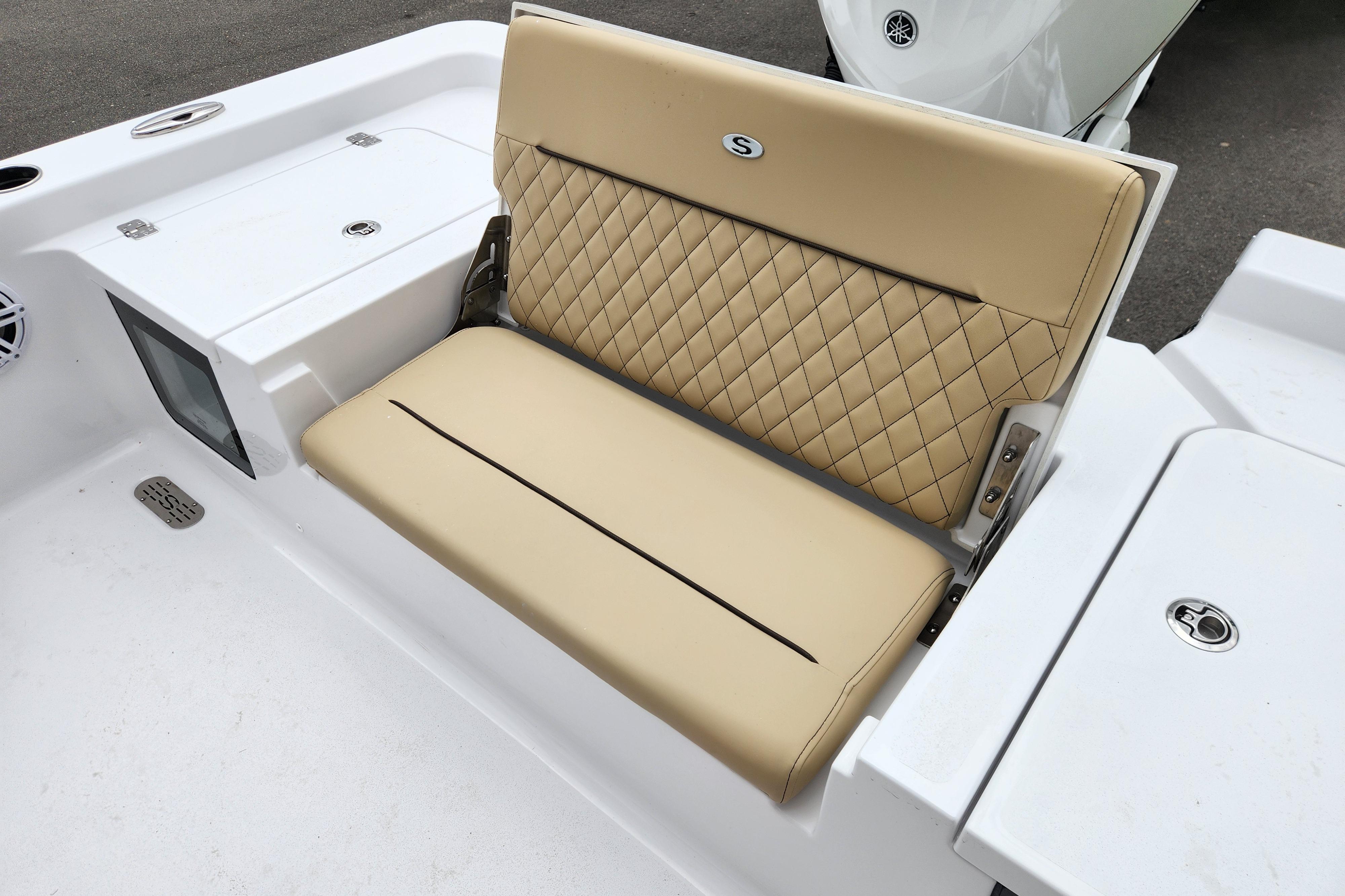 2026 Sportsman Masters 247 Bay Boat with tan quilted seating and white deck.