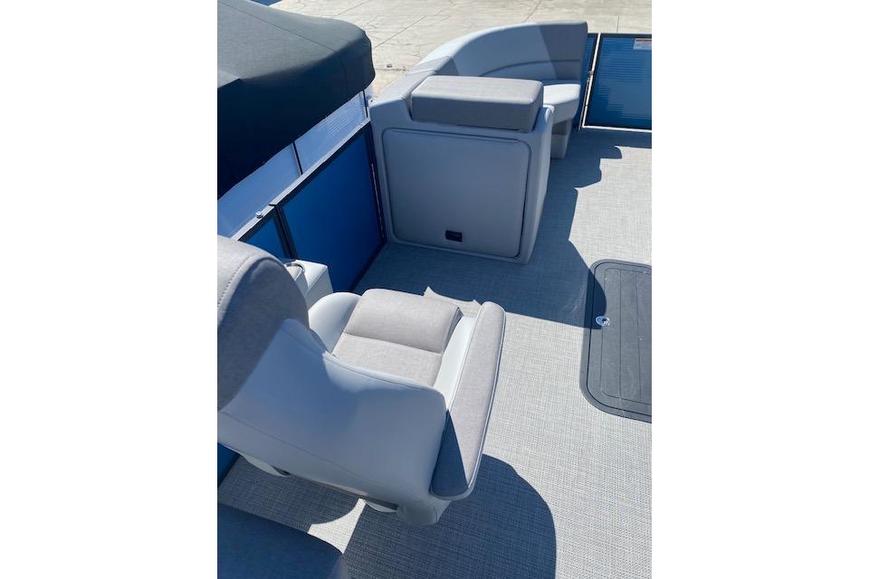 Interior seating of 2026 Manitou 23 AURORA RF VPII 575 pontoon boat.