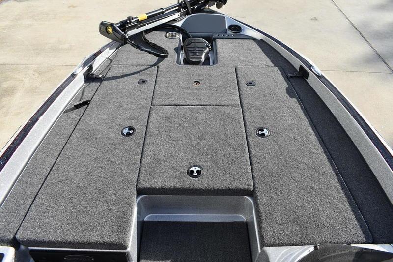 2026 Triton 179 TrX boat deck with carpeted surface and storage compartments.