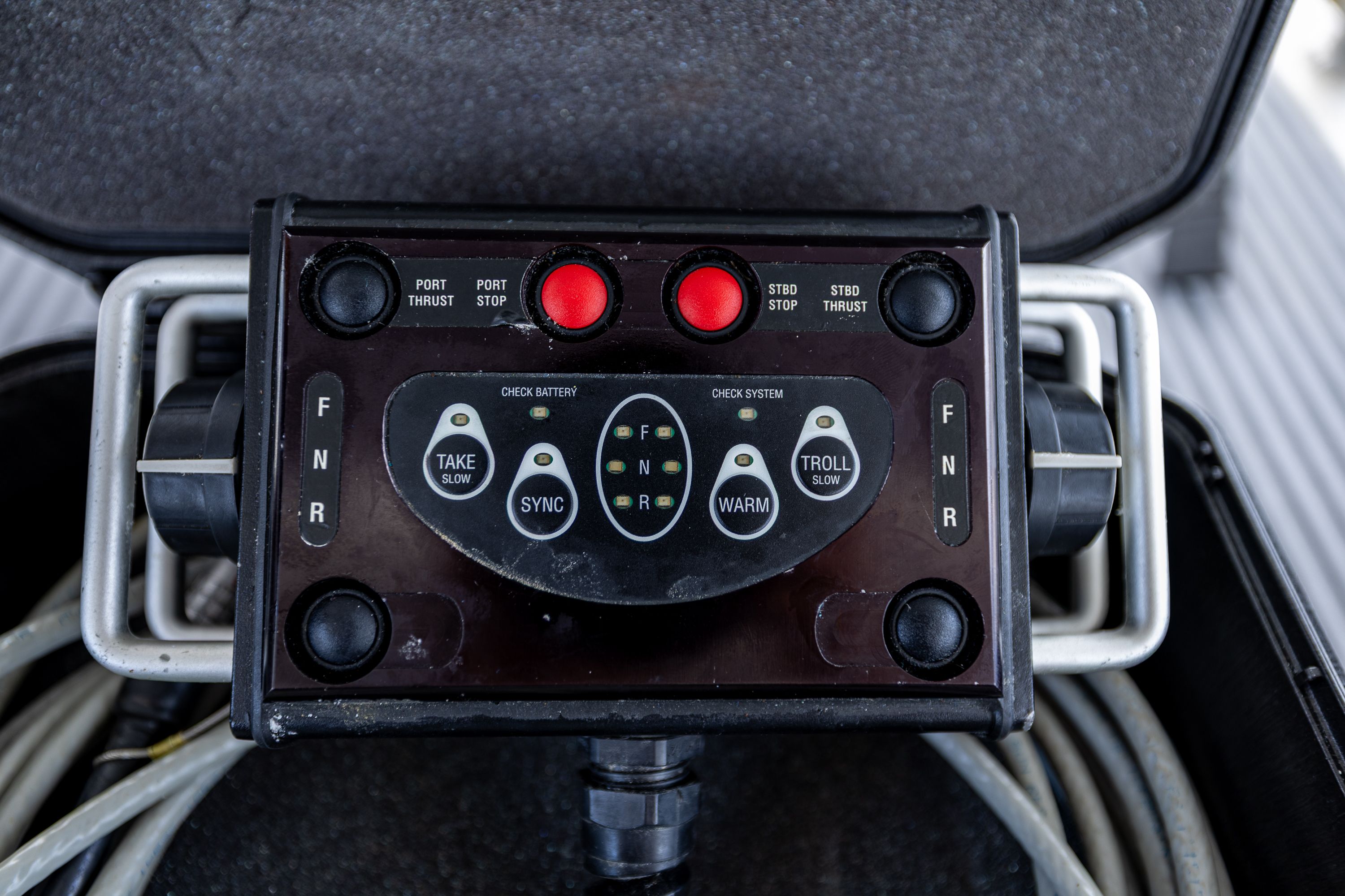 Close-up of a control panel with various buttons and indicators.