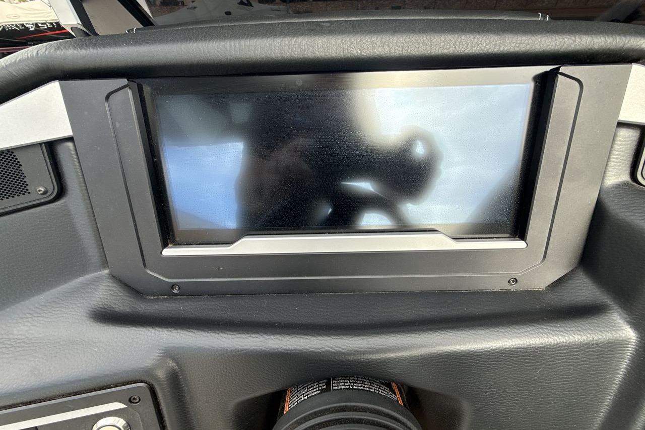 2024 Supra SA 550 dashboard touchscreen display in a sleek black interior.