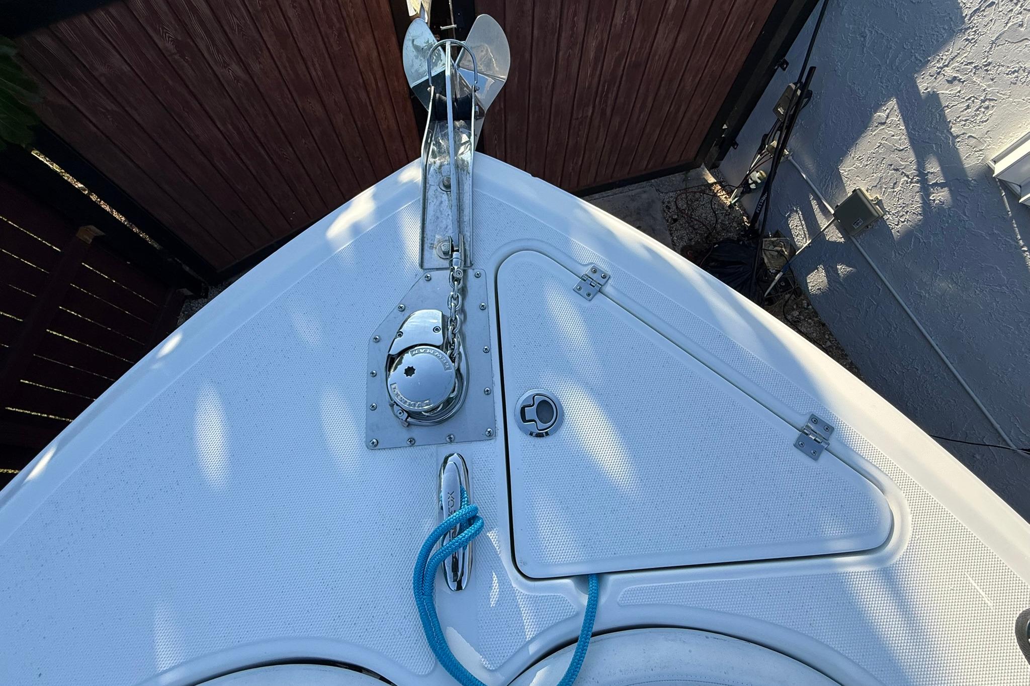 Bow of 2014 Sea Fox 256 Commander with anchor and blue rope.