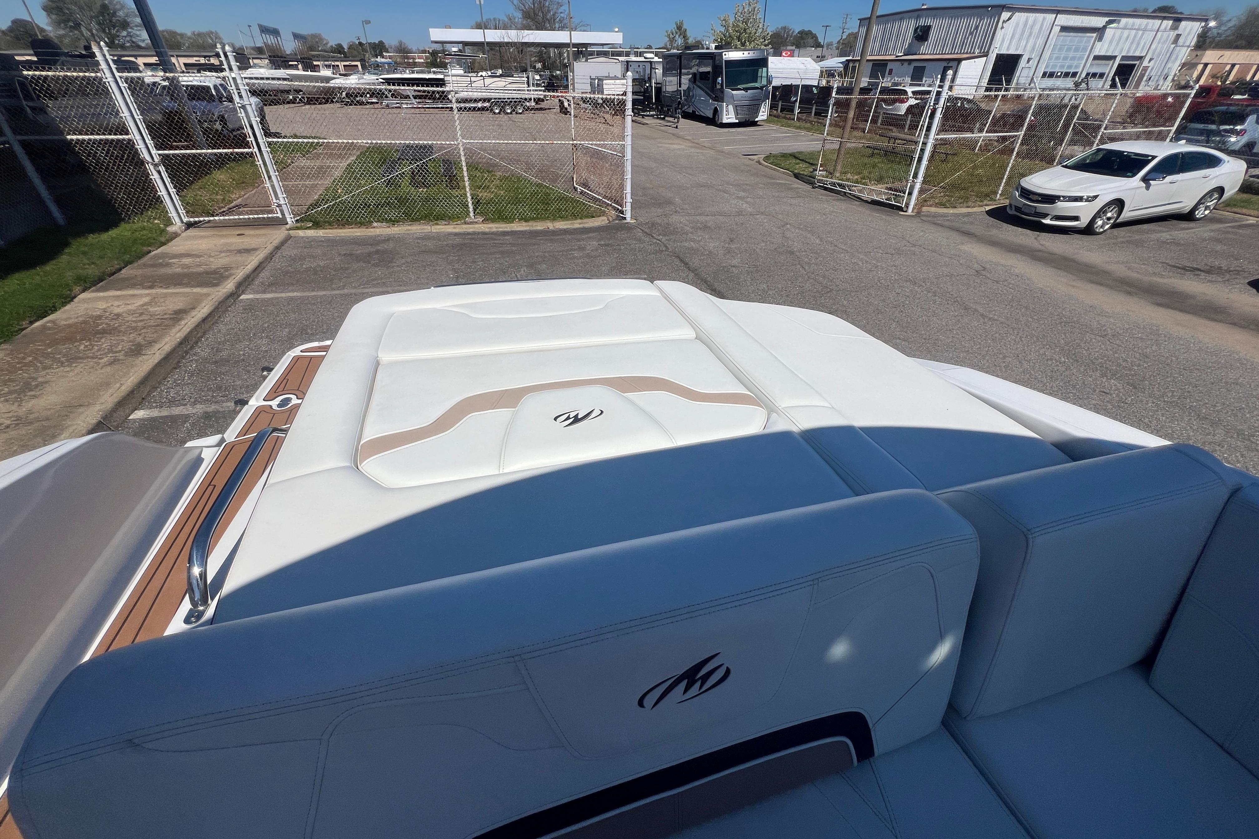 2017 Monterey 298SS Super Sport boat interior with white seating and outdoor view.