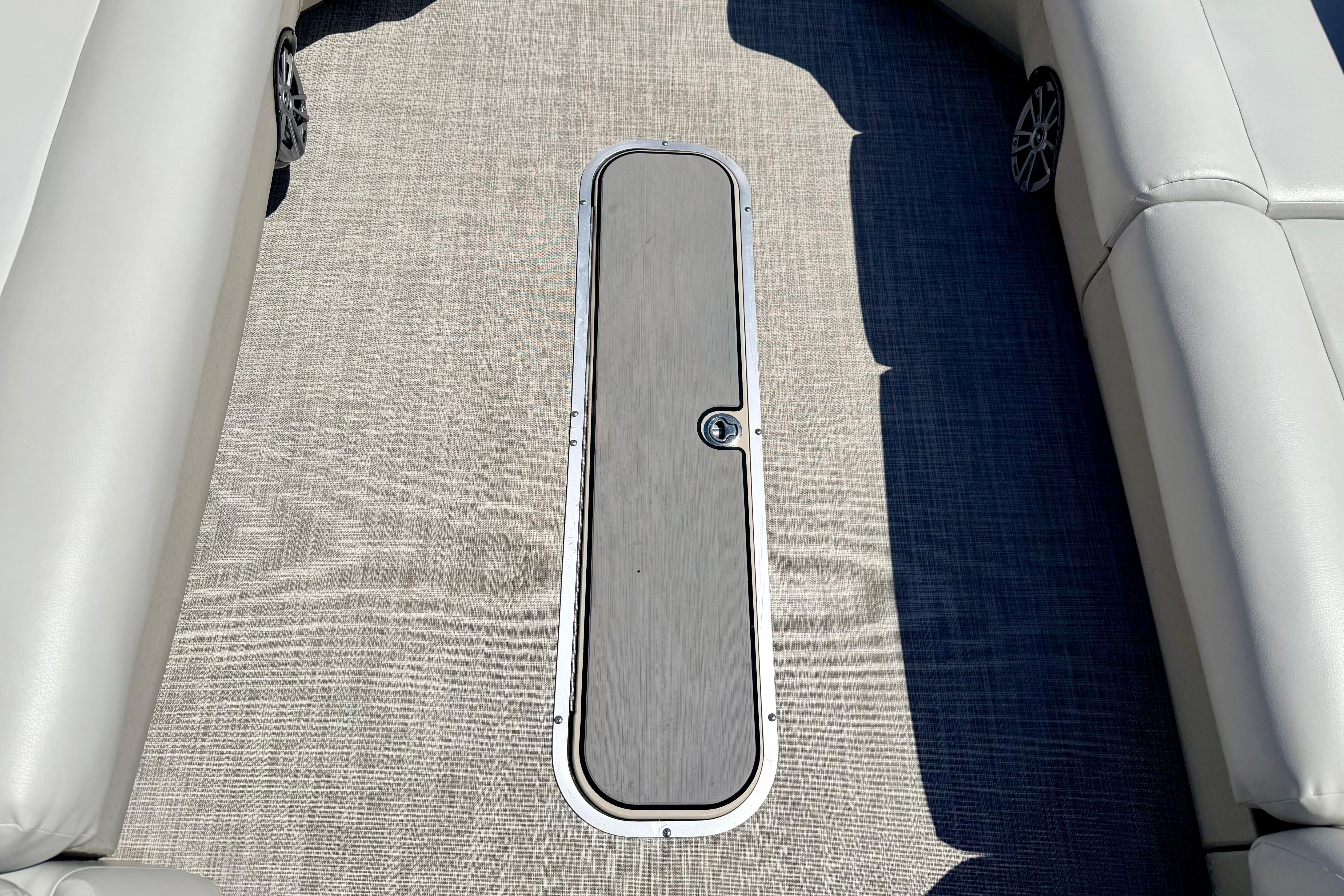 2019 Crestliner 240 Rally DX CW boat interior with sleek flooring and cushioned seating.