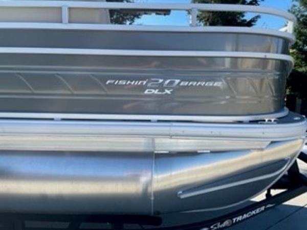 2024 Sun Tracker Fishin' Barge 20 DLX pontoon boat side view.