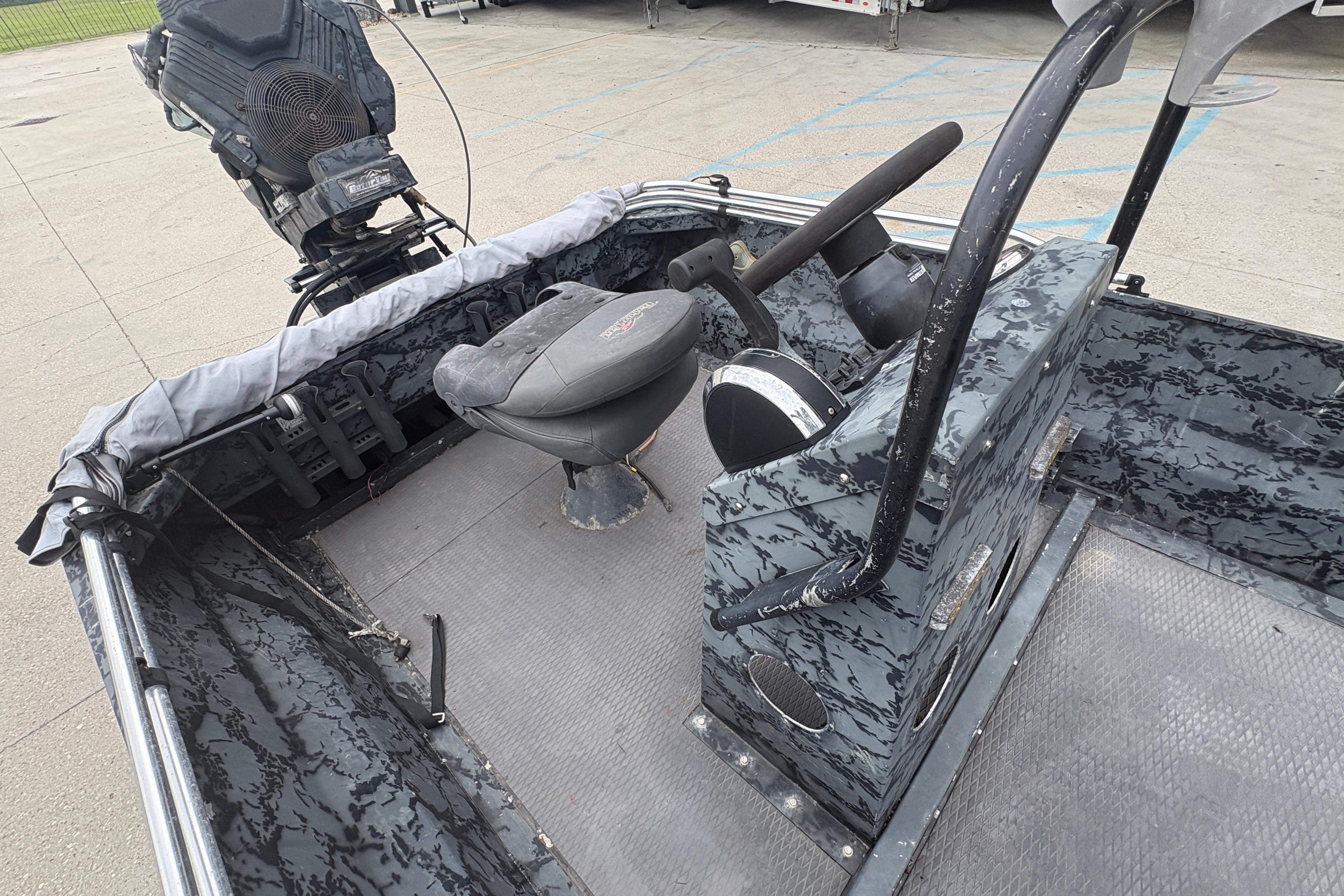 2020 Gator Tail Extreme boat interior with steering console and seat.