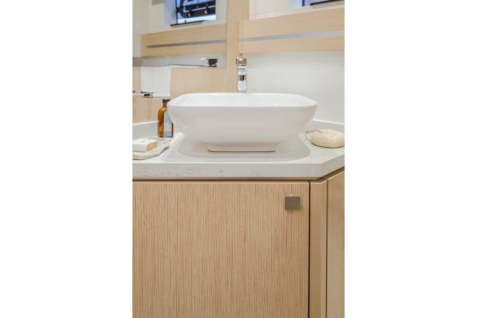 Modern bathroom with sink in Privilege Signature 510, 2025.