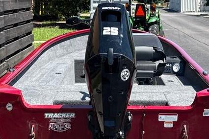 2025 Tracker Super Guide V-16 T boat with Mercury 25 engine, red exterior.