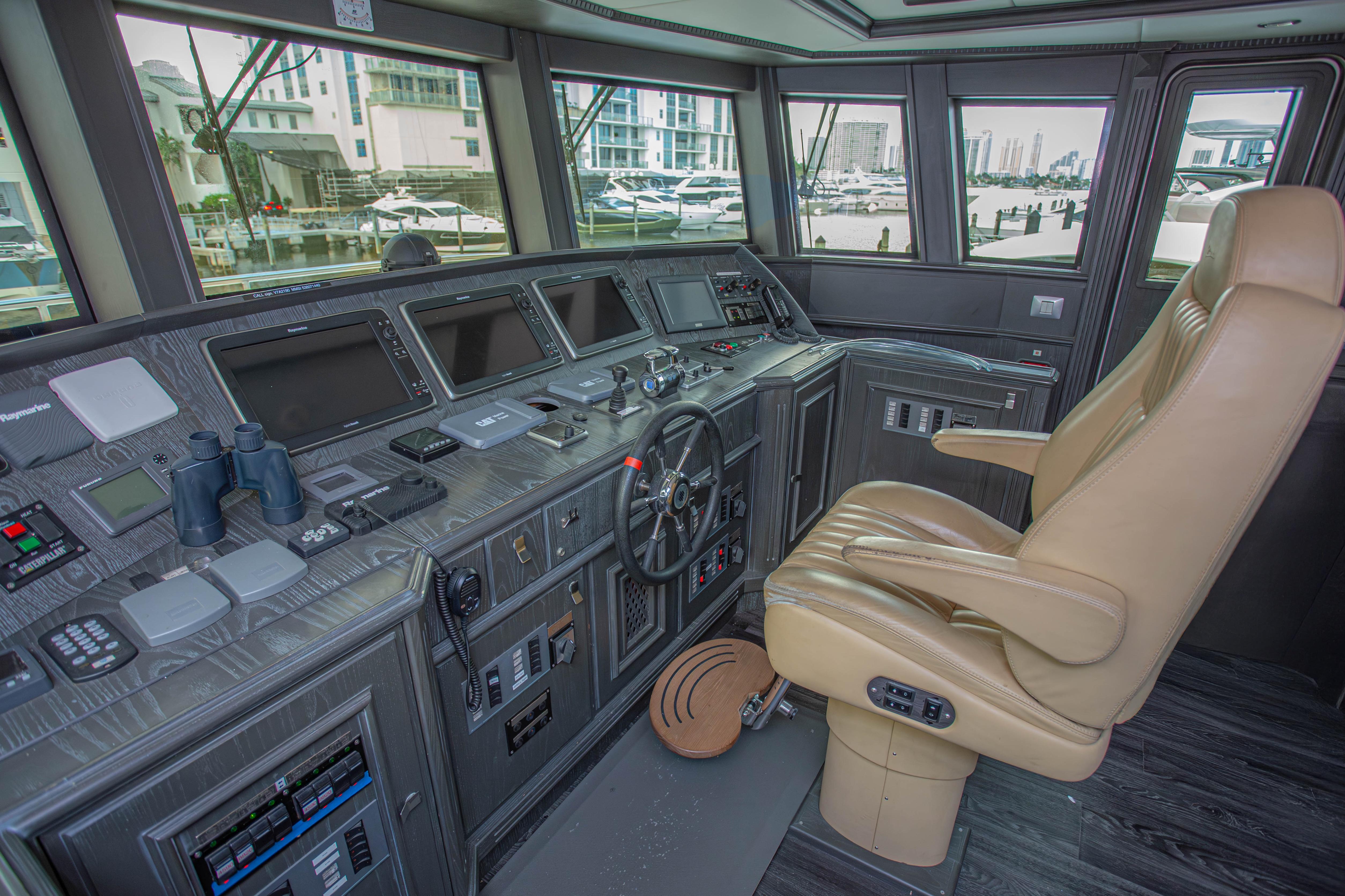 Control room of 2014 Fifth Ocean Yachts 24m Explorer Yacht with advanced navigation equipment.