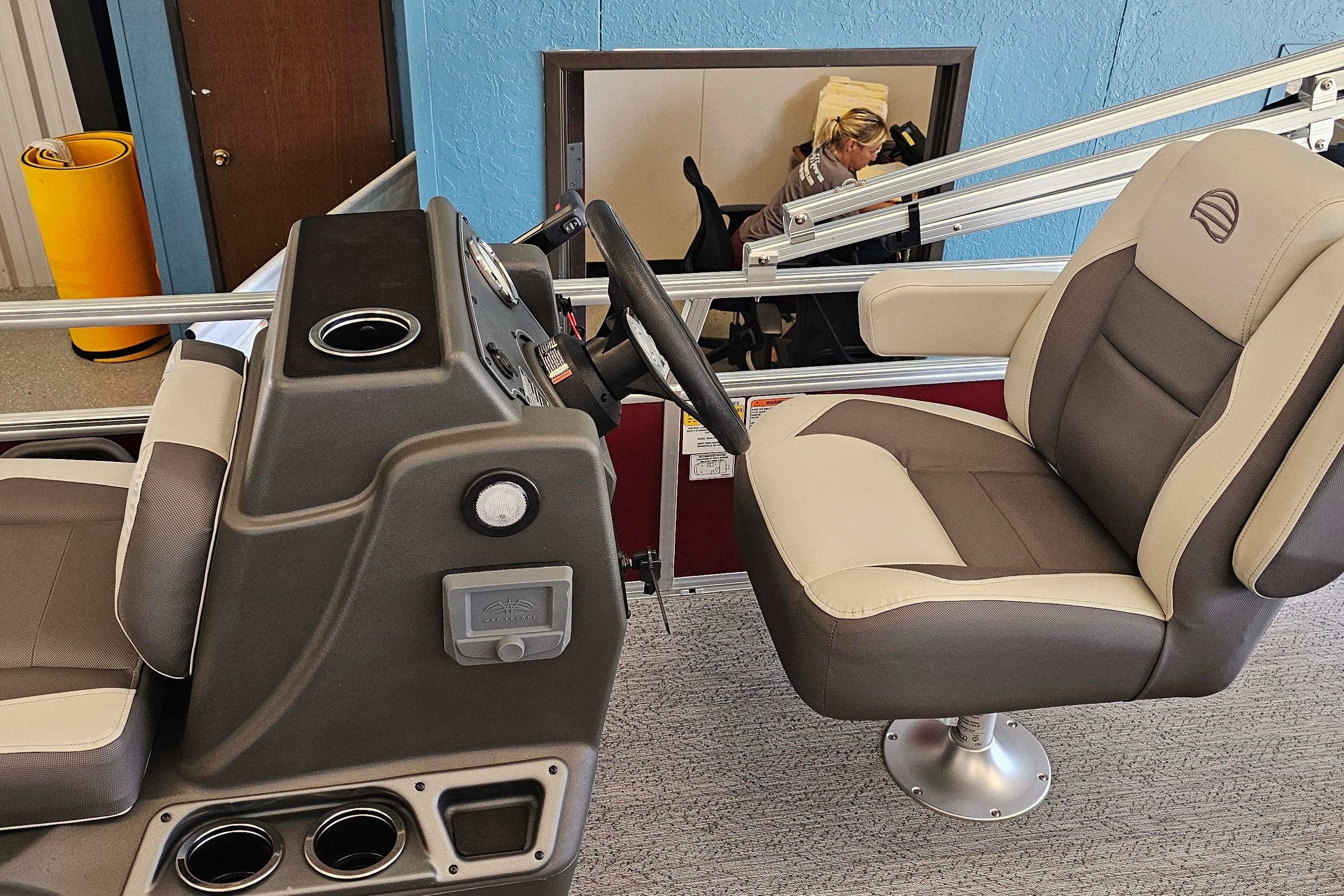 2026 Sun Tracker Bass Buggy 16 XL Select boat interior with steering console and seating.