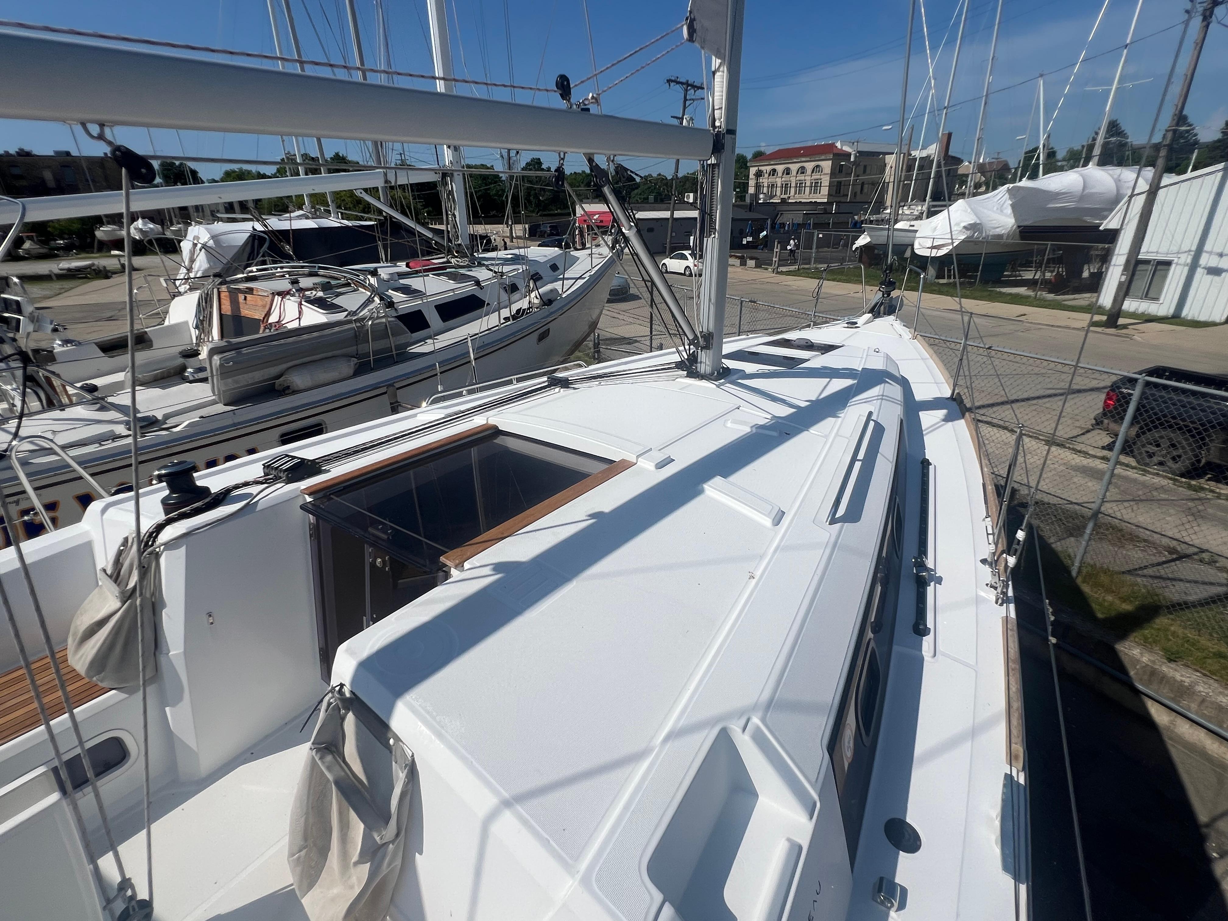 2019 Beneteau Oceanis 35.1 sailboat docked, showcasing sleek deck design and rigging.