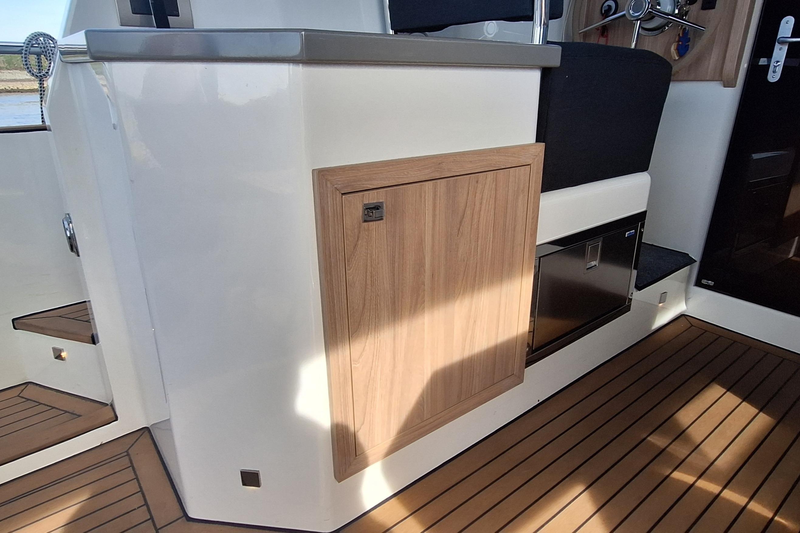 2023 Antaris X boat interior with wooden cabinetry and sleek design.