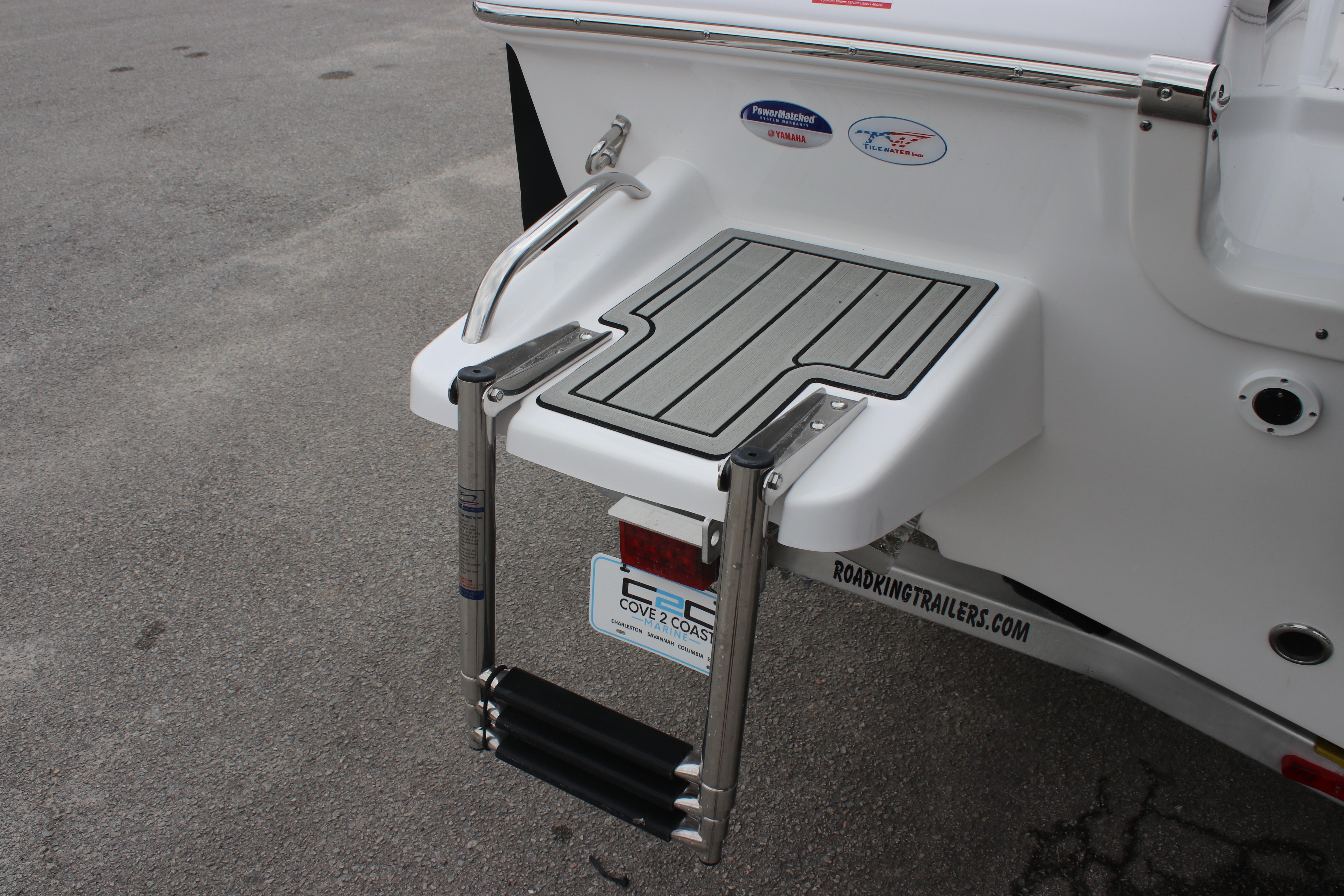 2026 Tidewater 198 CC Adventure boat with swim platform and ladder.